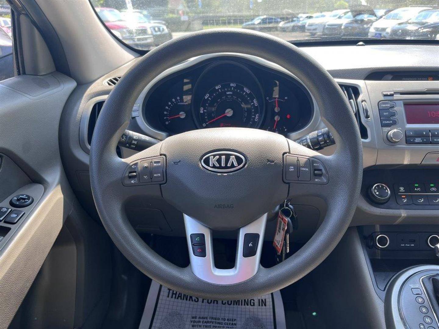 2011 Brown /Grey Kia Sportage (KNDPB3A2XB7) with an 2.4l I-4 MPI Dohc Cvvt 2. engine, Automatic transmission, located at 745 East Steele Rd., West Columbia, SC, 29170, (803) 755-9148, 33.927212, -81.148483 - Special Internet Price! 2011 Kia Sportage Base with AM/FM radio, Cruise control, Manual air conditioning, Cloth interior, Powered windows, Powered door locks, Plus more! - Photo#5