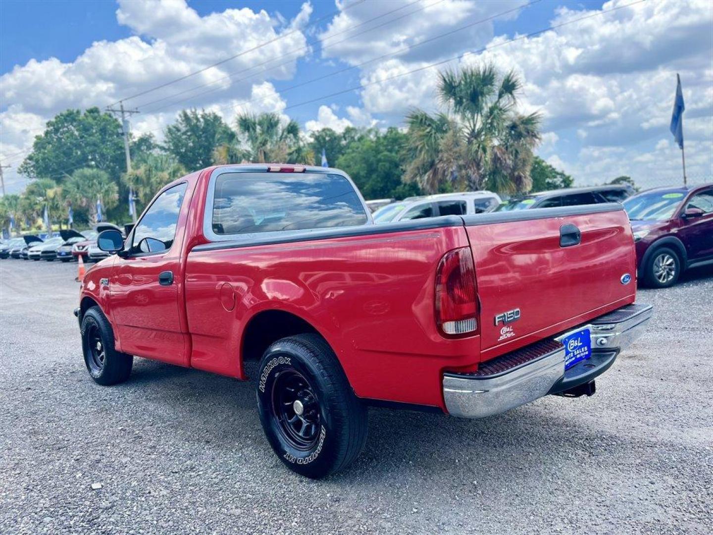 1997 Red /Tan Ford F150 (1FTDF17W0VN) with an 4.6l V8 EFI Sohc 4.6l engine, Automatic transmission, located at 745 East Steele Rd., West Columbia, SC, 29170, (803) 755-9148, 33.927212, -81.148483 - Photo#1