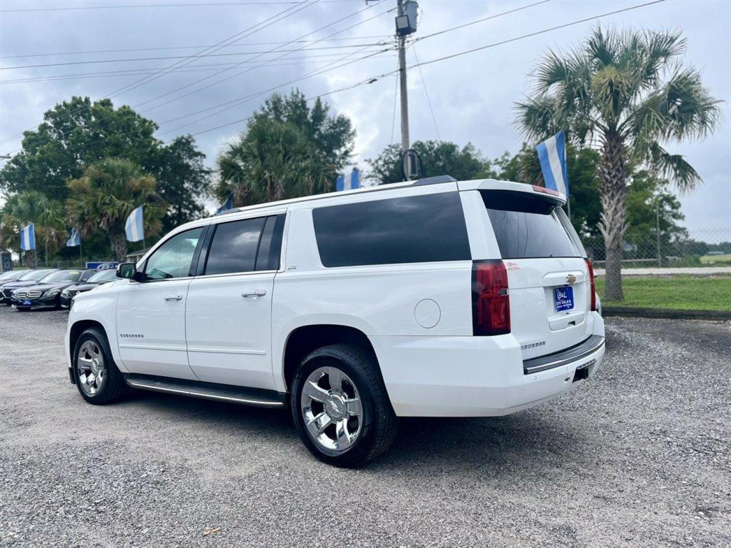 2015 White /Taupe Chevrolet Suburban (1GNSKKKC2FR) with an 5.3l V8 DI VVT Flex 5.3l engine, Automatic transmission, located at 745 East Steele Rd., West Columbia, SC, 29170, (803) 755-9148, 33.927212, -81.148483 - Special Internet Price! 2015 Chevrolet Suburban 1500 LTZ with Bluetooth, Backup camera, Other Apps, Cruise control, Sunroof, Leather interior, Powered driver seat, 3rd row seating, Dual rear entertainment, Powered liftgate, Powered windows, Powered door locks, Plus more! - Photo#1