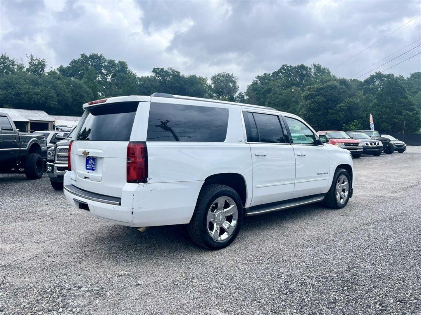 2015 White /Taupe Chevrolet Suburban (1GNSKKKC2FR) with an 5.3l V8 DI VVT Flex 5.3l engine, Automatic transmission, located at 745 East Steele Rd., West Columbia, SC, 29170, (803) 755-9148, 33.927212, -81.148483 - Special Internet Price! 2015 Chevrolet Suburban 1500 LTZ with Bluetooth, Backup camera, Other Apps, Cruise control, Sunroof, Leather interior, Powered driver seat, 3rd row seating, Dual rear entertainment, Powered liftgate, Powered windows, Powered door locks, Plus more! - Photo#2