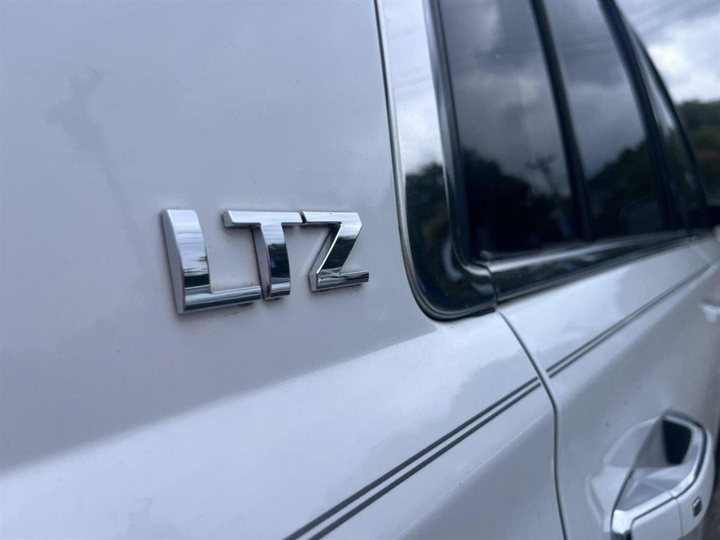 2015 White /Taupe Chevrolet Suburban (1GNSKKKC2FR) with an 5.3l V8 DI VVT Flex 5.3l engine, Automatic transmission, located at 745 East Steele Rd., West Columbia, SC, 29170, (803) 755-9148, 33.927212, -81.148483 - Special Internet Price! 2015 Chevrolet Suburban 1500 LTZ with Bluetooth, Backup camera, Other Apps, Cruise control, Sunroof, Leather interior, Powered driver seat, 3rd row seating, Dual rear entertainment, Powered liftgate, Powered windows, Powered door locks, Plus more! - Photo#40