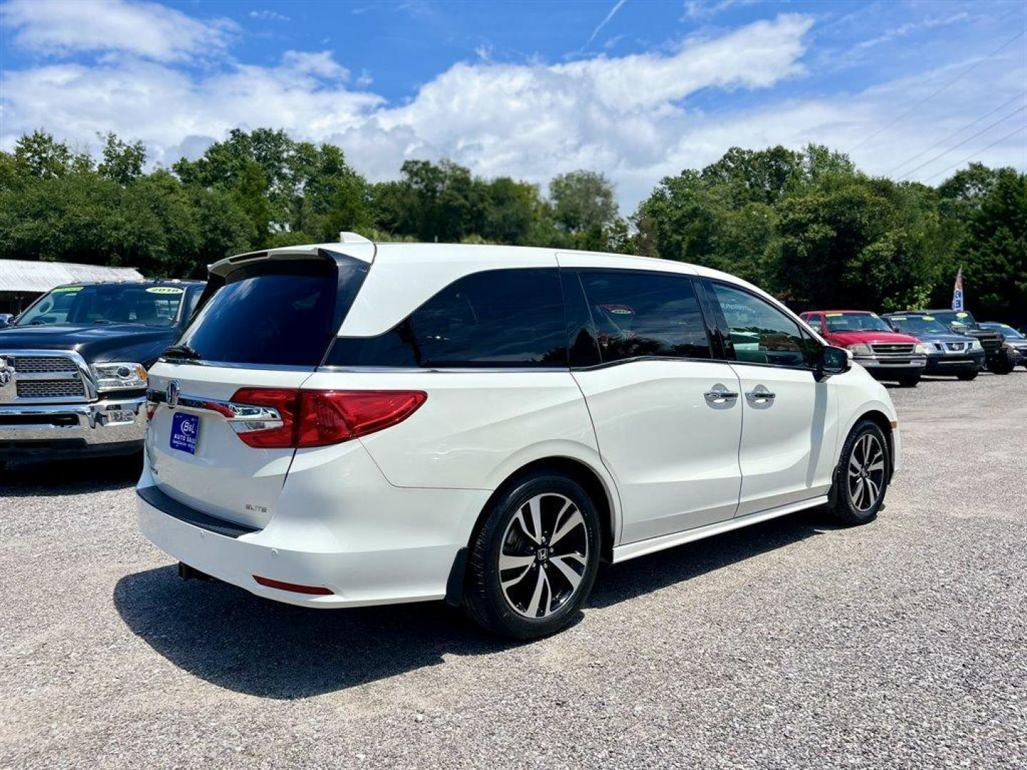 2019 White /Taupe Honda Odyssey (5FNRL6H93KB) with an 3.5l V6 MPI Sohc Vtec 3.5 engine, Automatic transmission, located at 745 East Steele Rd., West Columbia, SC, 29170, (803) 755-9148, 33.927212, -81.148483 - Special Internet Price! 2019 Honda Odyssey Elite with Bluetooth, Cruise control, Backup camera, Navigation, Sunroof, Heating and cooling front seats, Leather interior, Cab view camera, 3rd row seating, Rear attached vacuum, Powered liftgate, Powered windows, Powered door locks, Plus more! - Photo#2