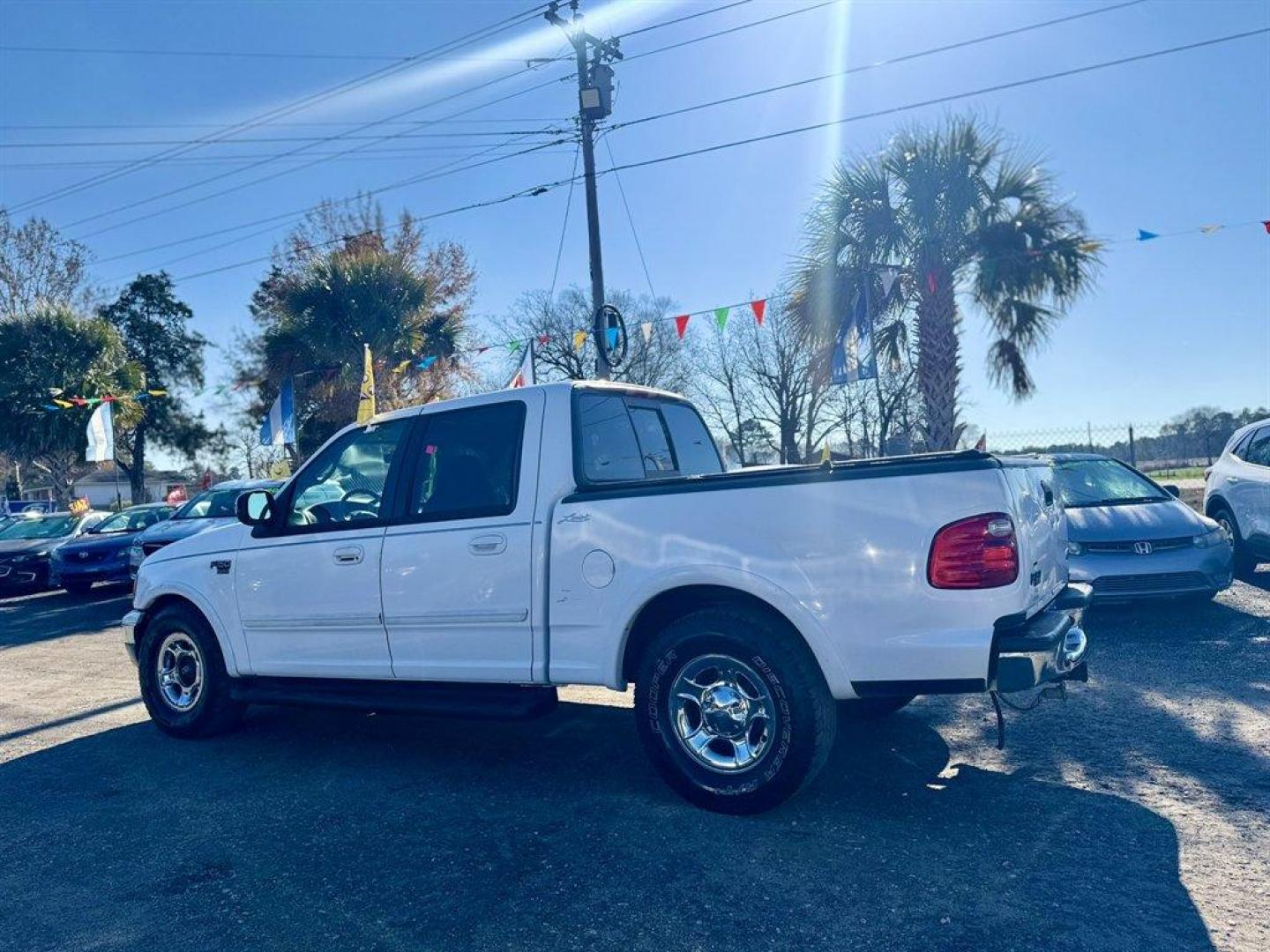 2001 White /Grey Ford F150 (1FTRW07L01K) with an 5.4l V8 EFI Sohc 5.4l engine, Automatic transmission, located at 745 East Steele Rd., West Columbia, SC, 29170, (803) 755-9148, 33.927212, -81.148483 - Photo#5