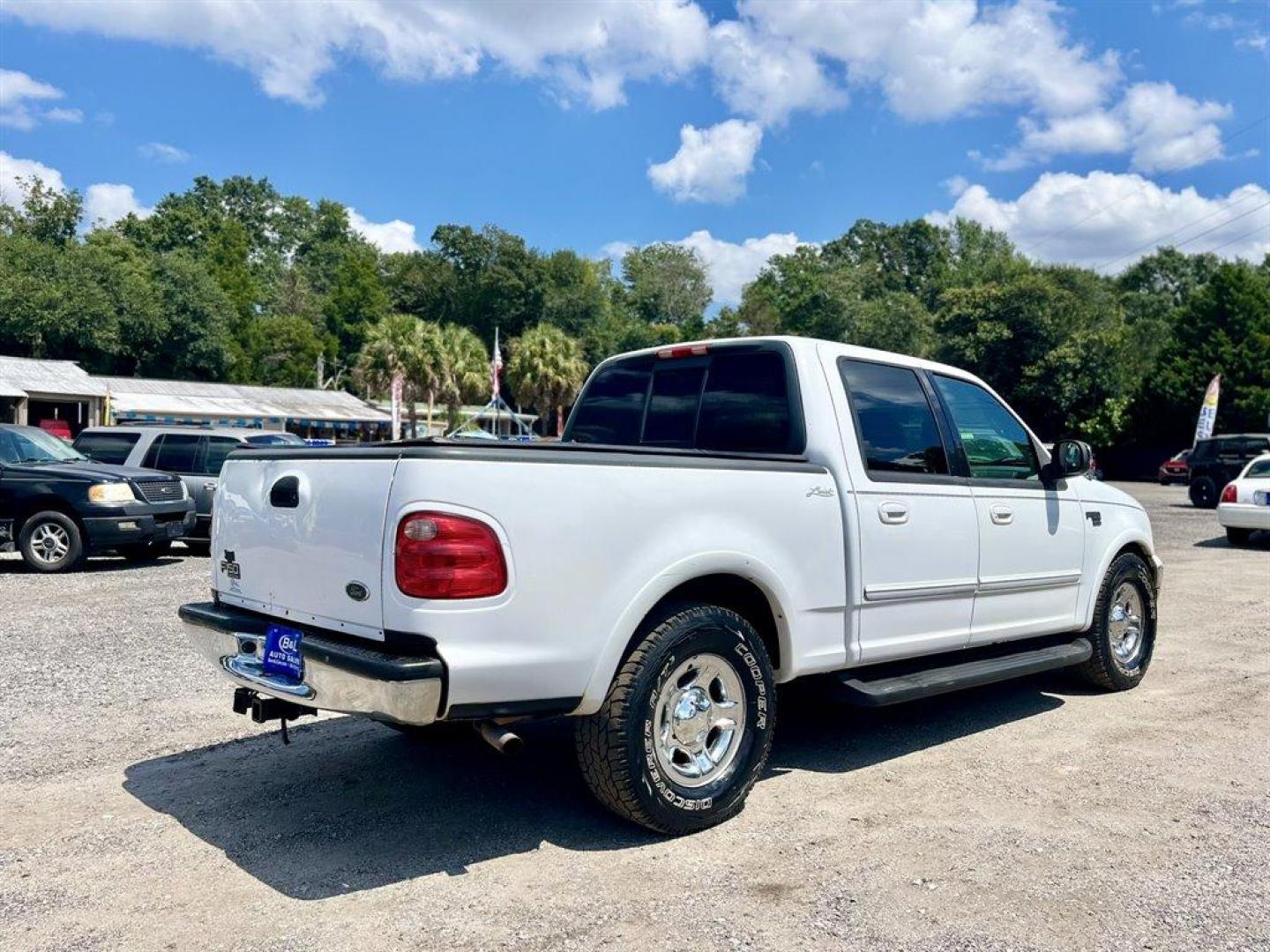 2001 White /Grey Ford F150 (1FTRW07L01K) with an 5.4l V8 EFI Sohc 5.4l engine, Automatic transmission, located at 745 East Steele Rd., West Columbia, SC, 29170, (803) 755-9148, 33.927212, -81.148483 - Special Internet Price! 2001 Ford F150 with AM/FM radio, Cruise control, Manual air conditioning, Sunroof, Leather interior, Powered windows, Powered door locks, Plus more! - Photo#2