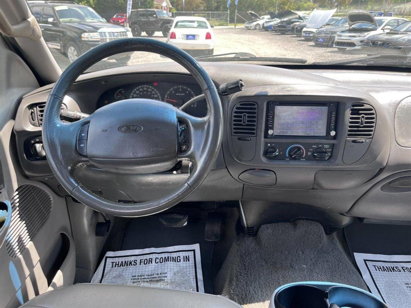 2001 White /Grey Ford F150 (1FTRW07L01K) with an 5.4l V8 EFI Sohc 5.4l engine, Automatic transmission, located at 745 East Steele Rd., West Columbia, SC, 29170, (803) 755-9148, 33.927212, -81.148483 - Special Internet Price! 2001 Ford F150 with AM/FM radio, Cruise control, Manual air conditioning, Sunroof, Leather interior, Powered windows, Powered door locks, Plus more! - Photo#4