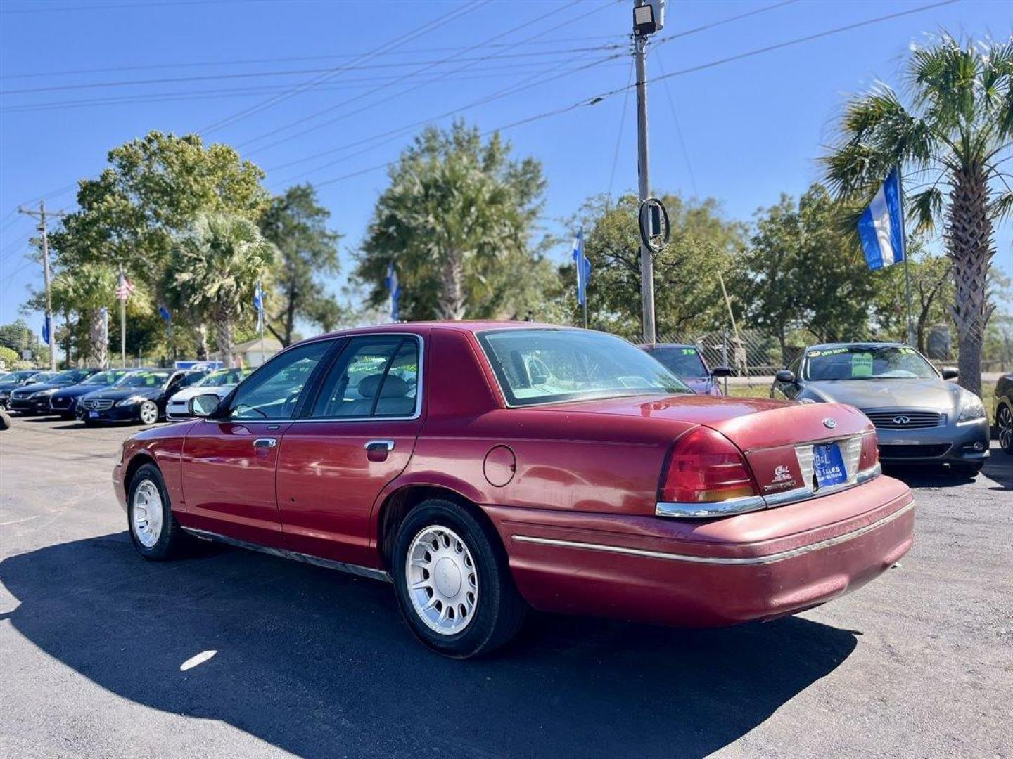 2000 Burgundy /Grey Ford Crown Victoria (2FAFP74W2YX) with an 4.6l V8 EFI Sohc 4.6l engine, Automatic transmission, located at 745 East Steele Rd., West Columbia, SC, 29170, (803) 755-9148, 33.927212, -81.148483 - Special Internet Price! 2000 Ford Crown Victoria LX with AM/FM stereo, Remote keyless entry, Air conditioning, Leather interior, Powered front seats, Powered windows, Powered door locks, Plus more! - Photo#1