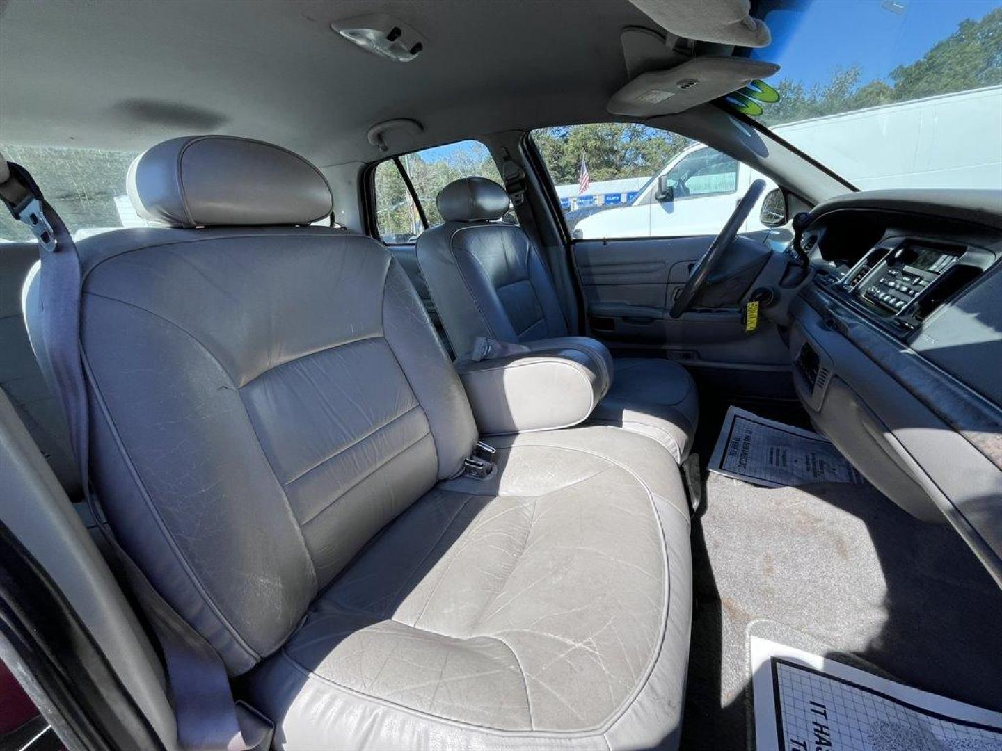 2000 Burgundy /Grey Ford Crown Victoria (2FAFP74W2YX) with an 4.6l V8 EFI Sohc 4.6l engine, Automatic transmission, located at 745 East Steele Rd., West Columbia, SC, 29170, (803) 755-9148, 33.927212, -81.148483 - Special Internet Price! 2000 Ford Crown Victoria LX with AM/FM stereo, Remote keyless entry, Air conditioning, Leather interior, Powered front seats, Powered windows, Powered door locks, Plus more! - Photo#23