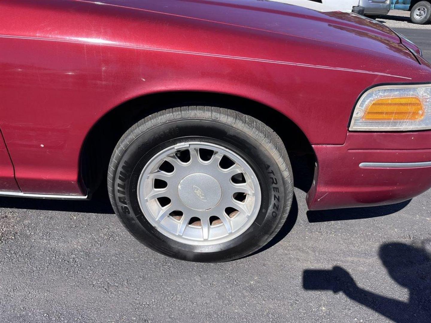 2000 Burgundy /Grey Ford Crown Victoria (2FAFP74W2YX) with an 4.6l V8 EFI Sohc 4.6l engine, Automatic transmission, located at 745 East Steele Rd., West Columbia, SC, 29170, (803) 755-9148, 33.927212, -81.148483 - Special Internet Price! 2000 Ford Crown Victoria LX with AM/FM stereo, Remote keyless entry, Air conditioning, Leather interior, Powered front seats, Powered windows, Powered door locks, Plus more! - Photo#27