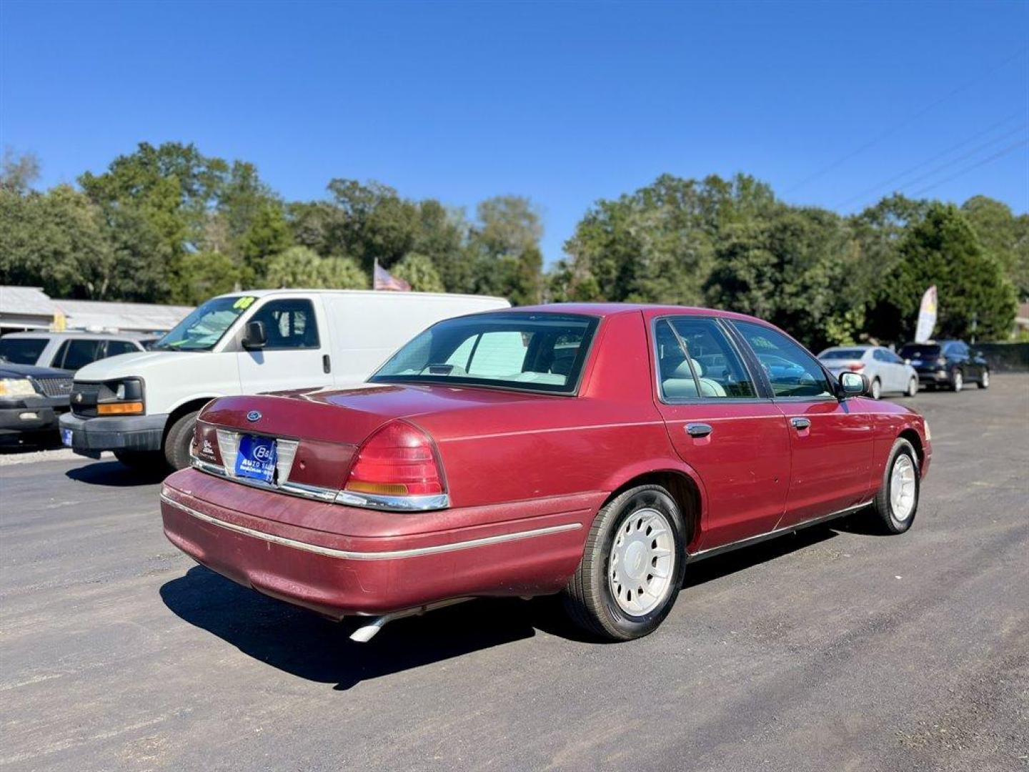 2000 Burgundy /Grey Ford Crown Victoria (2FAFP74W2YX) with an 4.6l V8 EFI Sohc 4.6l engine, Automatic transmission, located at 745 East Steele Rd., West Columbia, SC, 29170, (803) 755-9148, 33.927212, -81.148483 - Special Internet Price! 2000 Ford Crown Victoria LX with AM/FM stereo, Remote keyless entry, Air conditioning, Leather interior, Powered front seats, Powered windows, Powered door locks, Plus more! - Photo#2