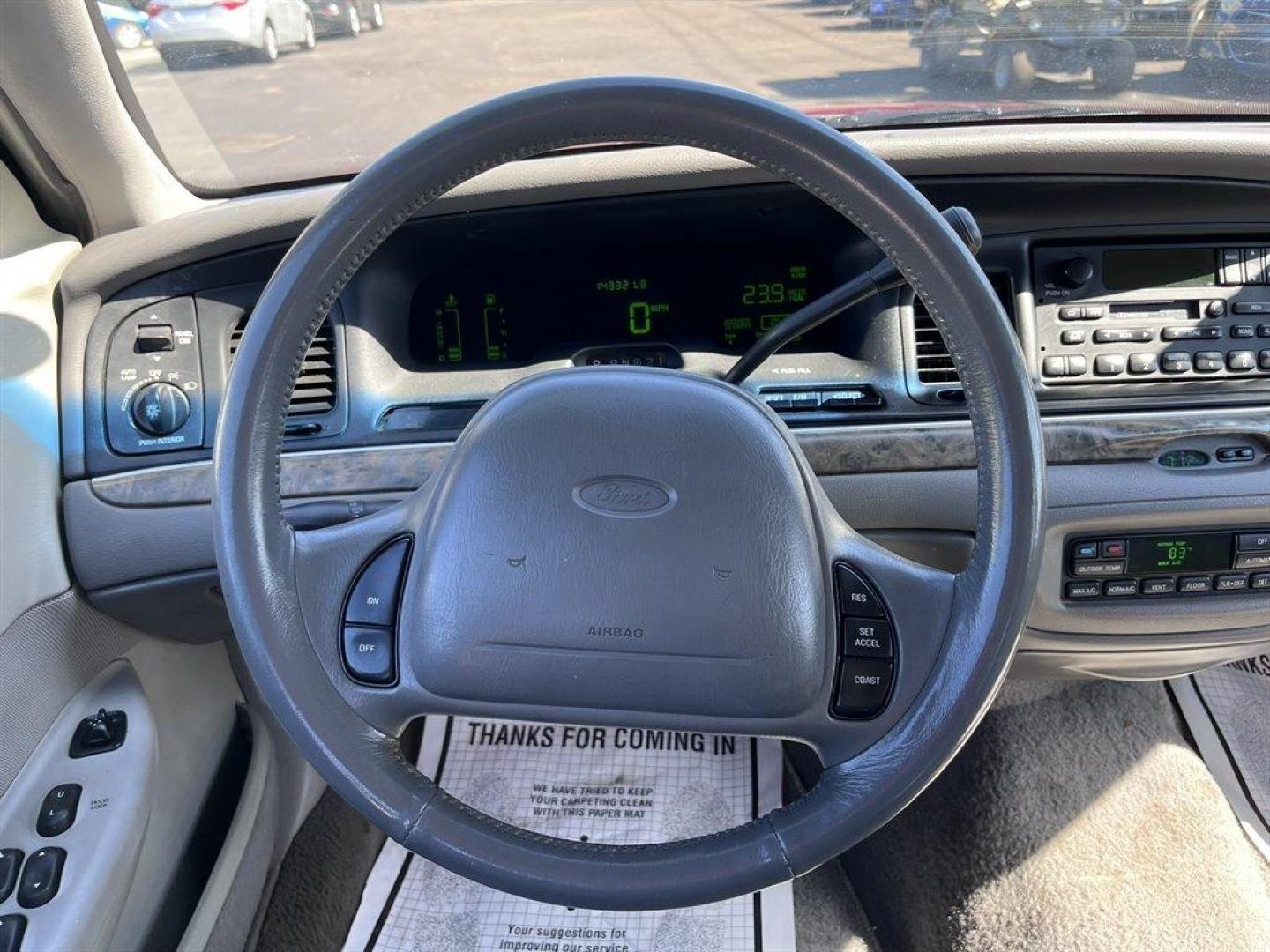 2000 Burgundy /Grey Ford Crown Victoria (2FAFP74W2YX) with an 4.6l V8 EFI Sohc 4.6l engine, Automatic transmission, located at 745 East Steele Rd., West Columbia, SC, 29170, (803) 755-9148, 33.927212, -81.148483 - Special Internet Price! 2000 Ford Crown Victoria LX with AM/FM stereo, Remote keyless entry, Air conditioning, Leather interior, Powered front seats, Powered windows, Powered door locks, Plus more! - Photo#5