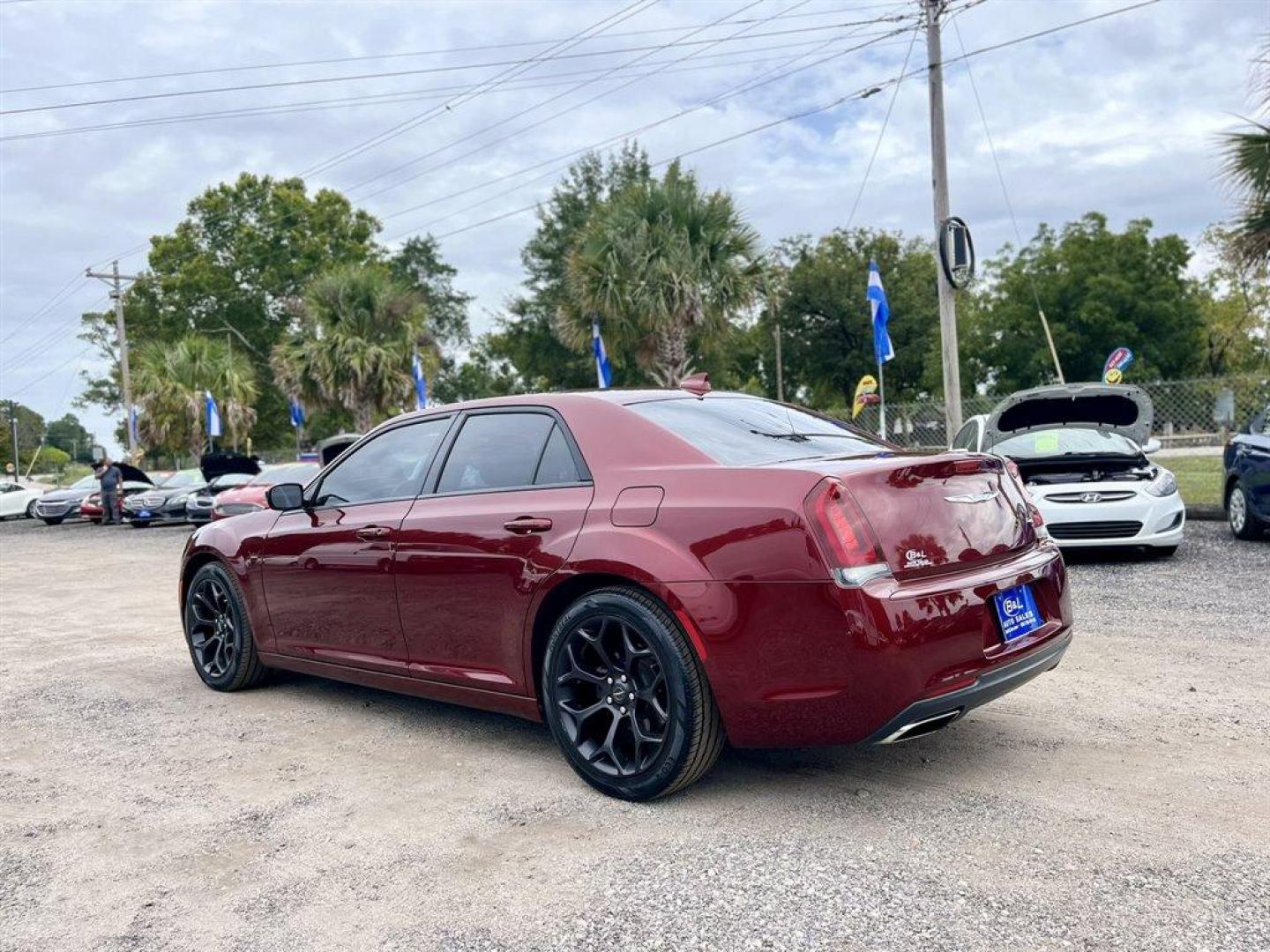 2019 Burgundy /Black Chrysler 300 (2C3CCABG3KH) with an 3.6l V6 MPI Dohc VVT Flex engine, Automatic transmission, located at 745 East Steele Rd., West Columbia, SC, 29170, (803) 755-9148, 33.927212, -81.148483 - Special Internet Price! 2019 Chrysler 300 with Bluetooth, Backup camera, Navigation, Cruise control, Push to start, Keyless entry, Leather interior, Heated front seats, Powered front seats, Powered windows, Powered door locks, Plus more! - Photo#1