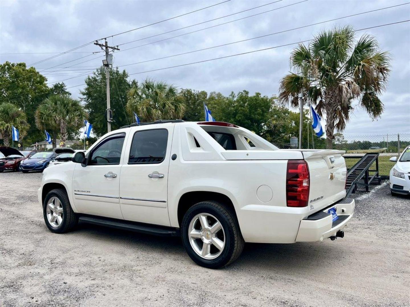 2013 White /Tan Chevrolet Avalanche (3GNMCGE01DG) with an 5.3l V8 SFI Flex 5.3l engine, Automatic transmission, located at 745 East Steele Rd., West Columbia, SC, 29170, (803) 755-9148, 33.927212, -81.148483 - Special Internet Price! 2013 Chevrolet Avalanche Black Diamond LTZ with AM/FM radio, Backup camera, Cruise control, Sunroof, Rear entertainment, Leather interior, Powered windows, Powered door locks, Plus more! - Photo#2