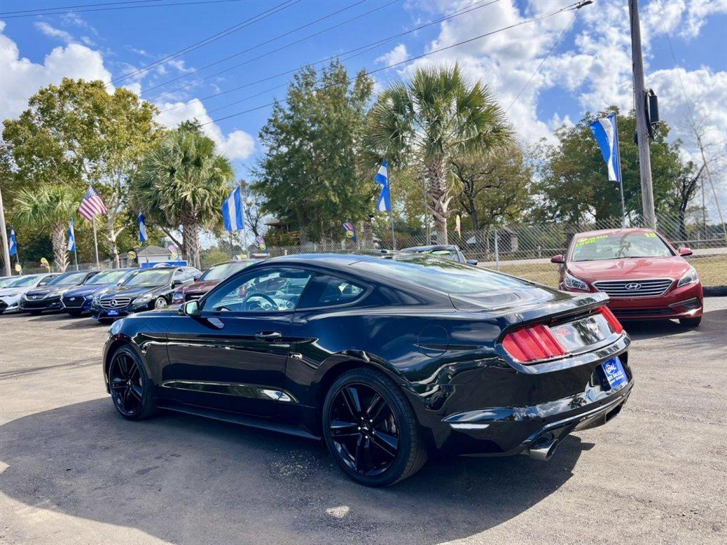 2015 Black /Black Ford Mustang (1FA6P8TH1F5) with an 2.3l I-4 DI Dohc Ecoboost engine, Manual transmission, located at 745 East Steele Rd., West Columbia, SC, 29170, (803) 755-9148, 33.927212, -81.148483 - Special Internet Price! 2015 Ford Mustang With AM/FM Stereo, 2 LCD Monitors In The Front, Manual Air Conditioning, Remote Keyless Entry, Front Bucket Seats, Leather Interior, Manual Transmission, Powered Windows, Powered Door Locks, Plus More! - Photo#2