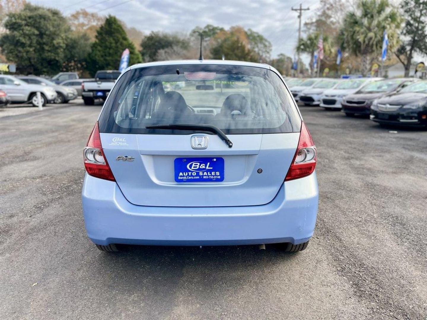 2008 Blue /Black Honda Fit (JHMGD38468S) with an 1.5l I-4 MPI Sohc Vtec 1. engine, Automatic transmission, located at 745 East Steele Rd., West Columbia, SC, 29170, (803) 755-9148, 33.927212, -81.148483 - Special Internet Price! 2008 Honda Fit with AM/FM radio, Manual air conditioning, Cloth interior, Powered windows, Powered door locks, Plus more! - Photo#2