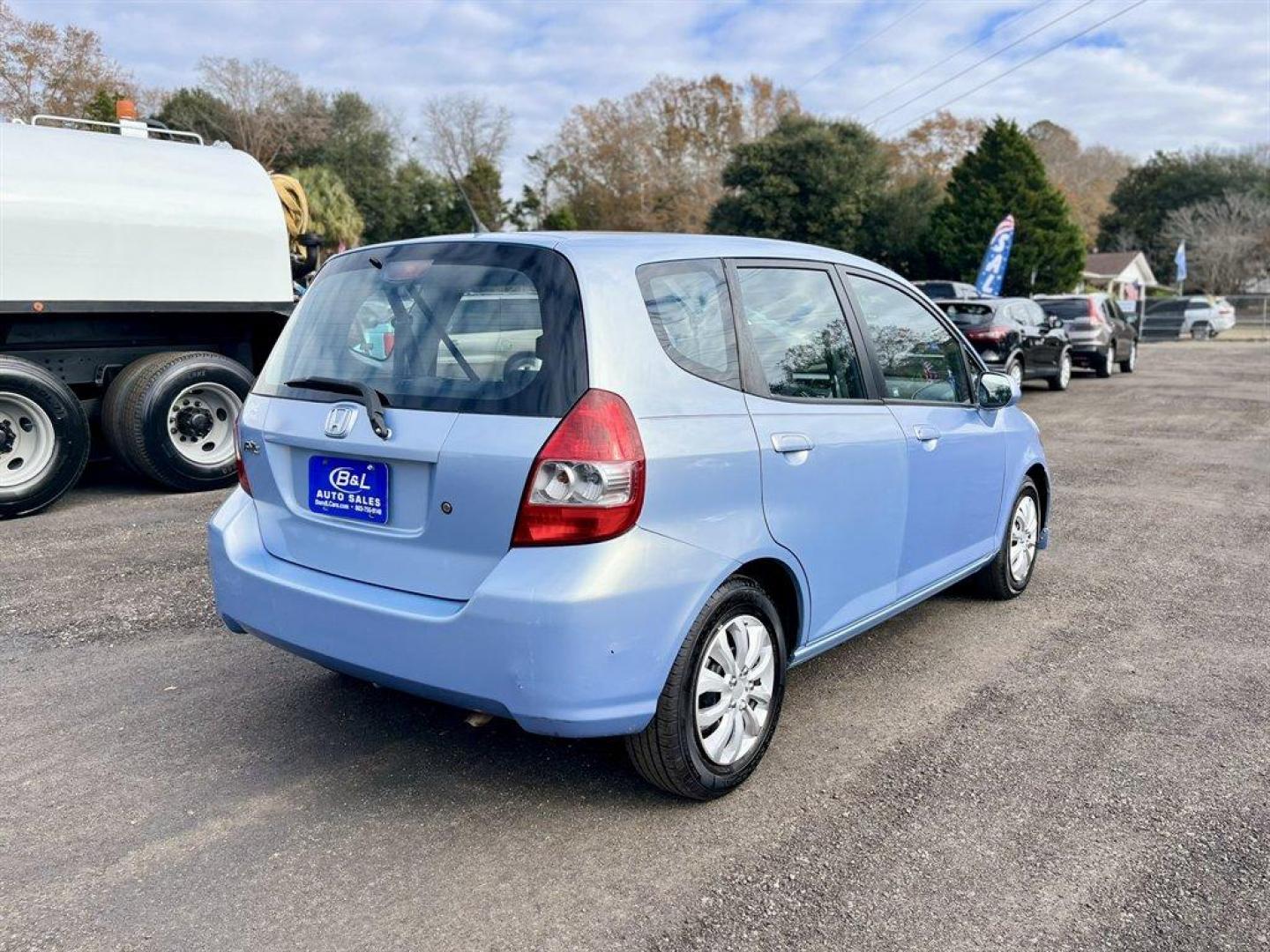 2008 Blue /Black Honda Fit (JHMGD38468S) with an 1.5l I-4 MPI Sohc Vtec 1. engine, Automatic transmission, located at 745 East Steele Rd., West Columbia, SC, 29170, (803) 755-9148, 33.927212, -81.148483 - Special Internet Price! 2008 Honda Fit with AM/FM radio, Manual air conditioning, Cloth interior, Powered windows, Powered door locks, Plus more! - Photo#3