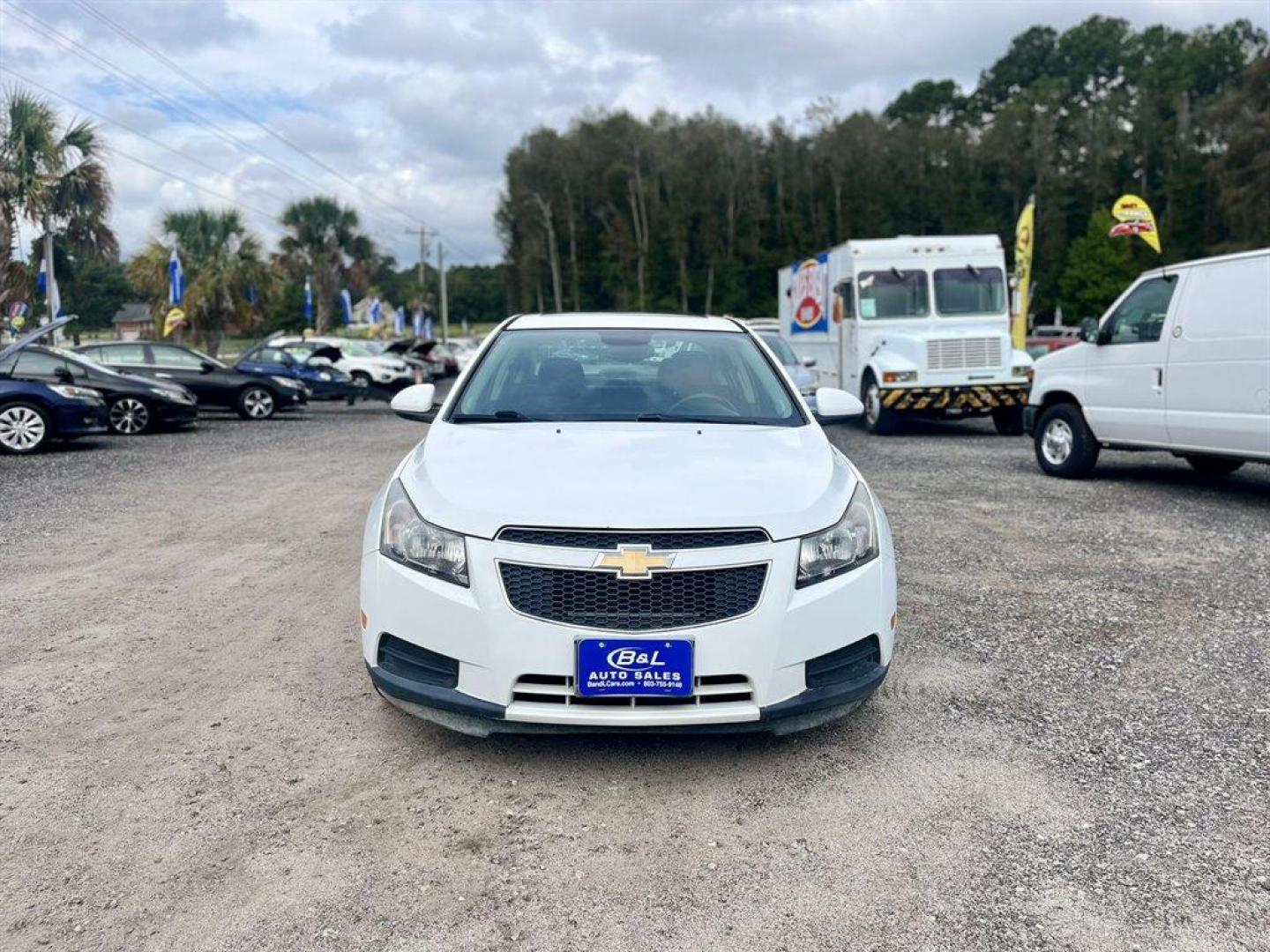 2014 White /Black Chevrolet Cruze (1G1PC5SBXE7) with an 1.4l I-4 MFI Dohc T/C 1.4 engine, Automatic transmission, located at 745 East Steele Rd., West Columbia, SC, 29170, (803) 755-9148, 33.927212, -81.148483 - Special Internet Price! 2014 Chevrolet Cruze with AM/FM radio, Backup camera, Cruise control, Keyless entry, Sunroof, Manual air conditioning, Cloth interior, Powered windows, Powered door locks, Plus more! - Photo#7