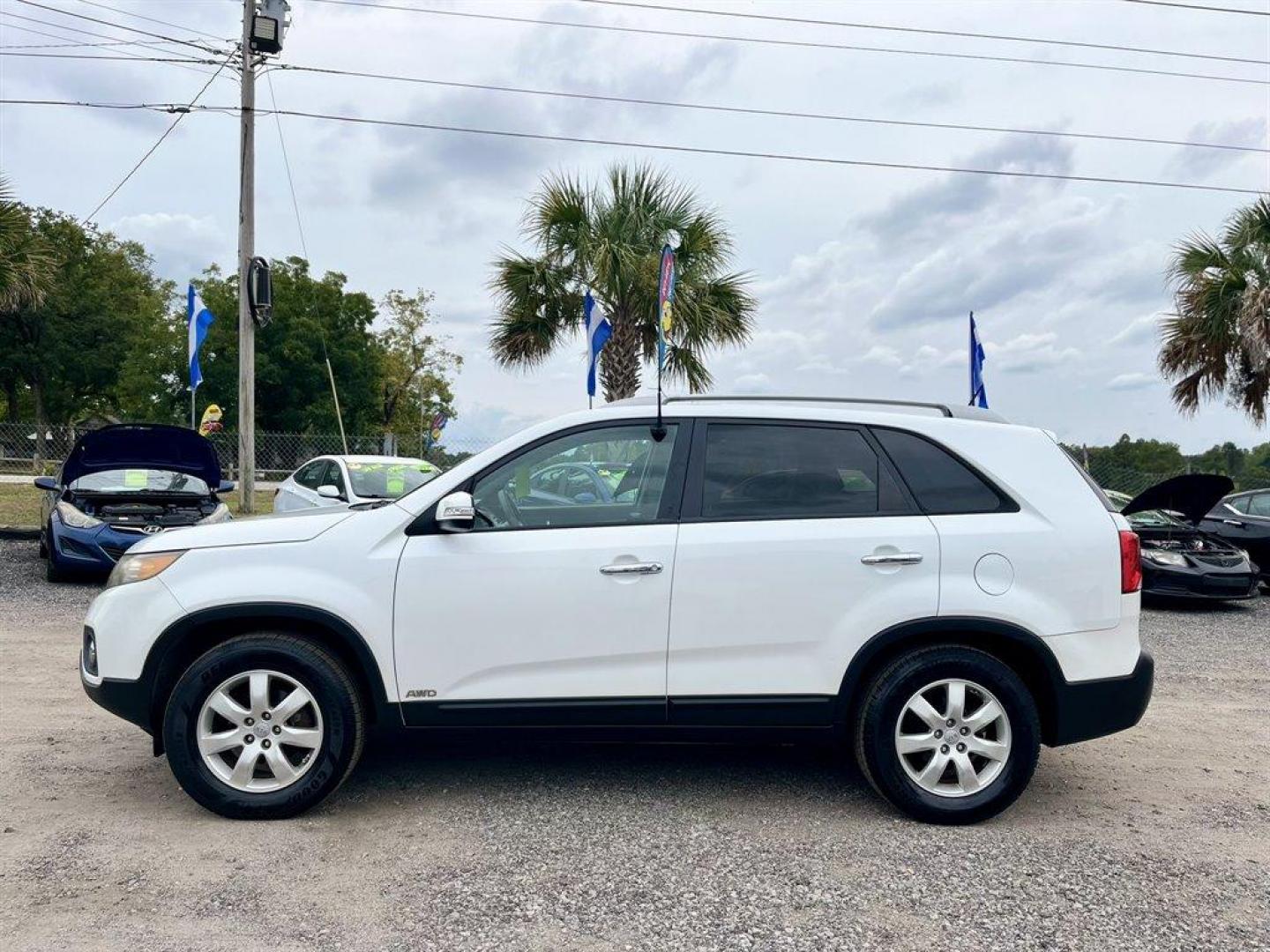 2012 White /Black Kia Sorento (5XYKTDA21CG) with an 3.5l V6 MPI Dohc Cvvt 3.5 engine, Automatic transmission, located at 745 East Steele Rd., West Columbia, SC, 29170, (803) 755-9148, 33.927212, -81.148483 - Special Internet Price! 2012 Kia Sorento with AM/FM radio, Cruise control, Manual air conditioning, 3rd row seating, Cloth interior, Powered windows, Powered door locks, Plus more! - Photo#1