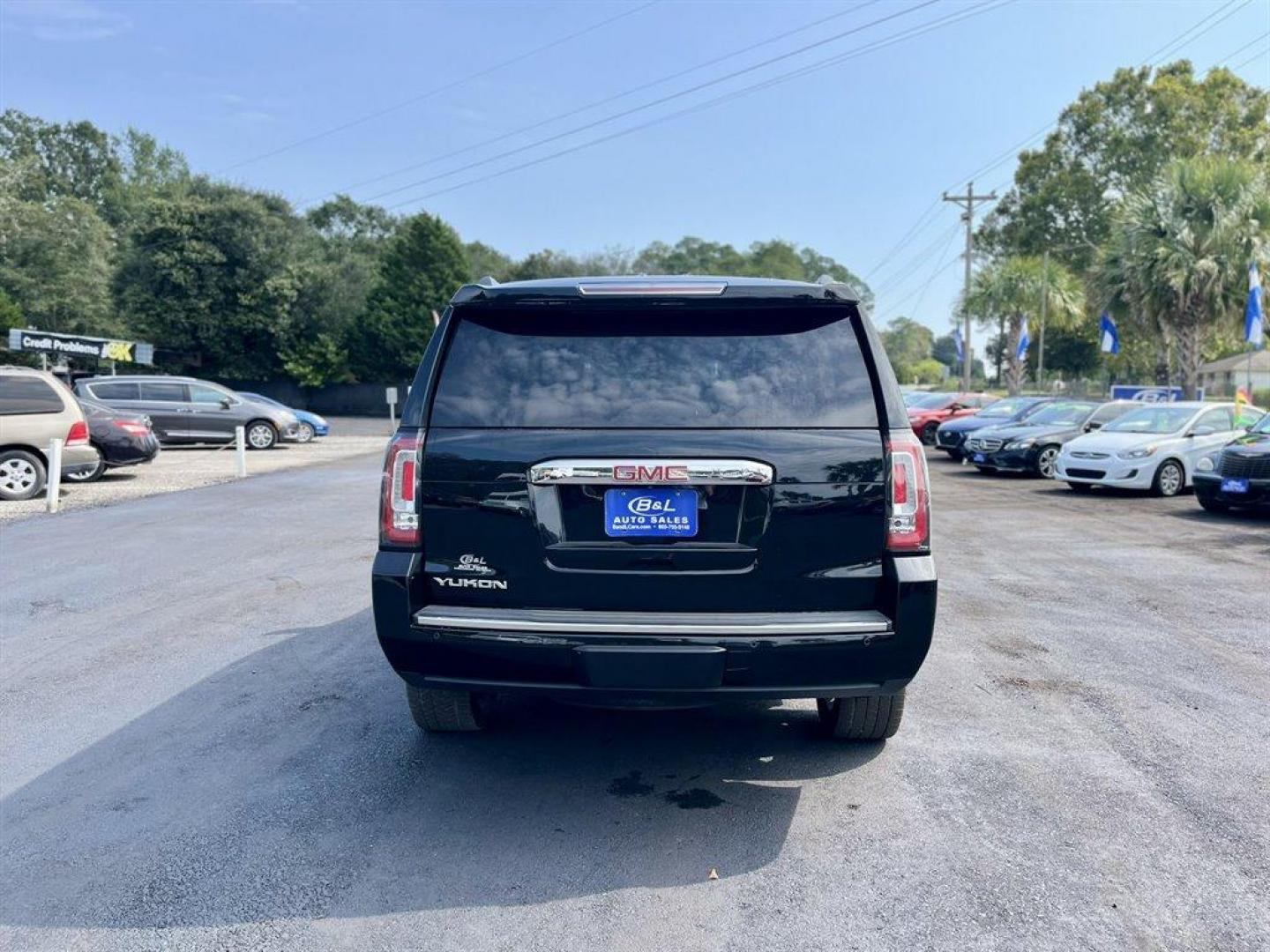 2016 Black /Black GMC Yukon (1GKS2CKJ8GR) with an 6.2l V8 DI OHV VVT S/C 6. engine, Automatic transmission, located at 745 East Steele Rd., West Columbia, SC, 29170, (803) 755-9148, 33.927212, -81.148483 - Special Internet Price! 2016 GMC Yukon with Bluetooth, AM/FM radio, Backup camera, Cruise control, Navigation, Sunroof, Leather interior, Rear entertainment, First and second row heated seats, Powered third row, Powered running boards, Powered liftgate, Powered windows, Powered door locks, Plus more - Photo#3