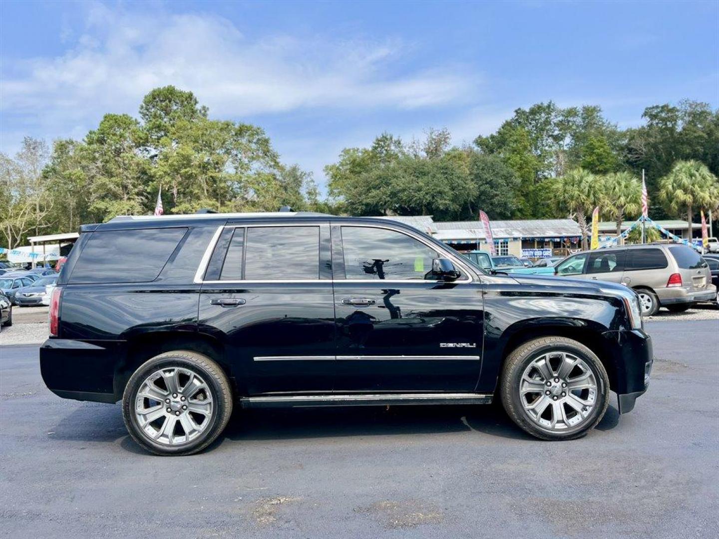 2016 Black /Black GMC Yukon (1GKS2CKJ8GR) with an 6.2l V8 DI OHV VVT S/C 6. engine, Automatic transmission, located at 745 East Steele Rd., West Columbia, SC, 29170, (803) 755-9148, 33.927212, -81.148483 - Special Internet Price! 2016 GMC Yukon with Bluetooth, AM/FM radio, Backup camera, Cruise control, Navigation, Sunroof, Leather interior, Rear entertainment, First and second row heated seats, Powered third row, Powered running boards, Powered liftgate, Powered windows, Powered door locks, Plus more - Photo#5