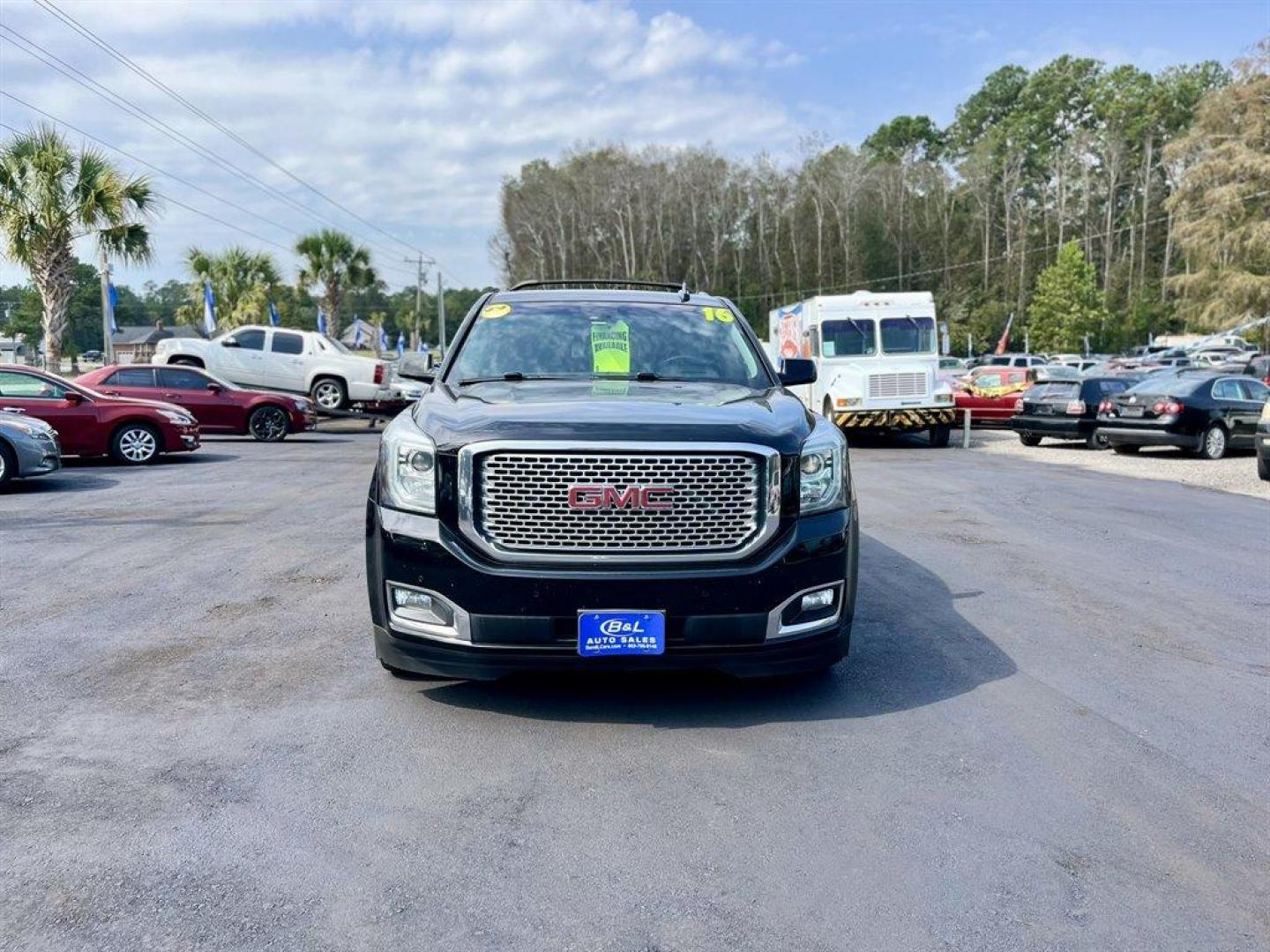 2016 Black /Black GMC Yukon (1GKS2CKJ8GR) with an 6.2l V8 DI OHV VVT S/C 6. engine, Automatic transmission, located at 745 East Steele Rd., West Columbia, SC, 29170, (803) 755-9148, 33.927212, -81.148483 - Special Internet Price! 2016 GMC Yukon with Bluetooth, AM/FM radio, Backup camera, Cruise control, Navigation, Sunroof, Leather interior, Rear entertainment, First and second row heated seats, Powered third row, Powered running boards, Powered liftgate, Powered windows, Powered door locks, Plus more - Photo#7