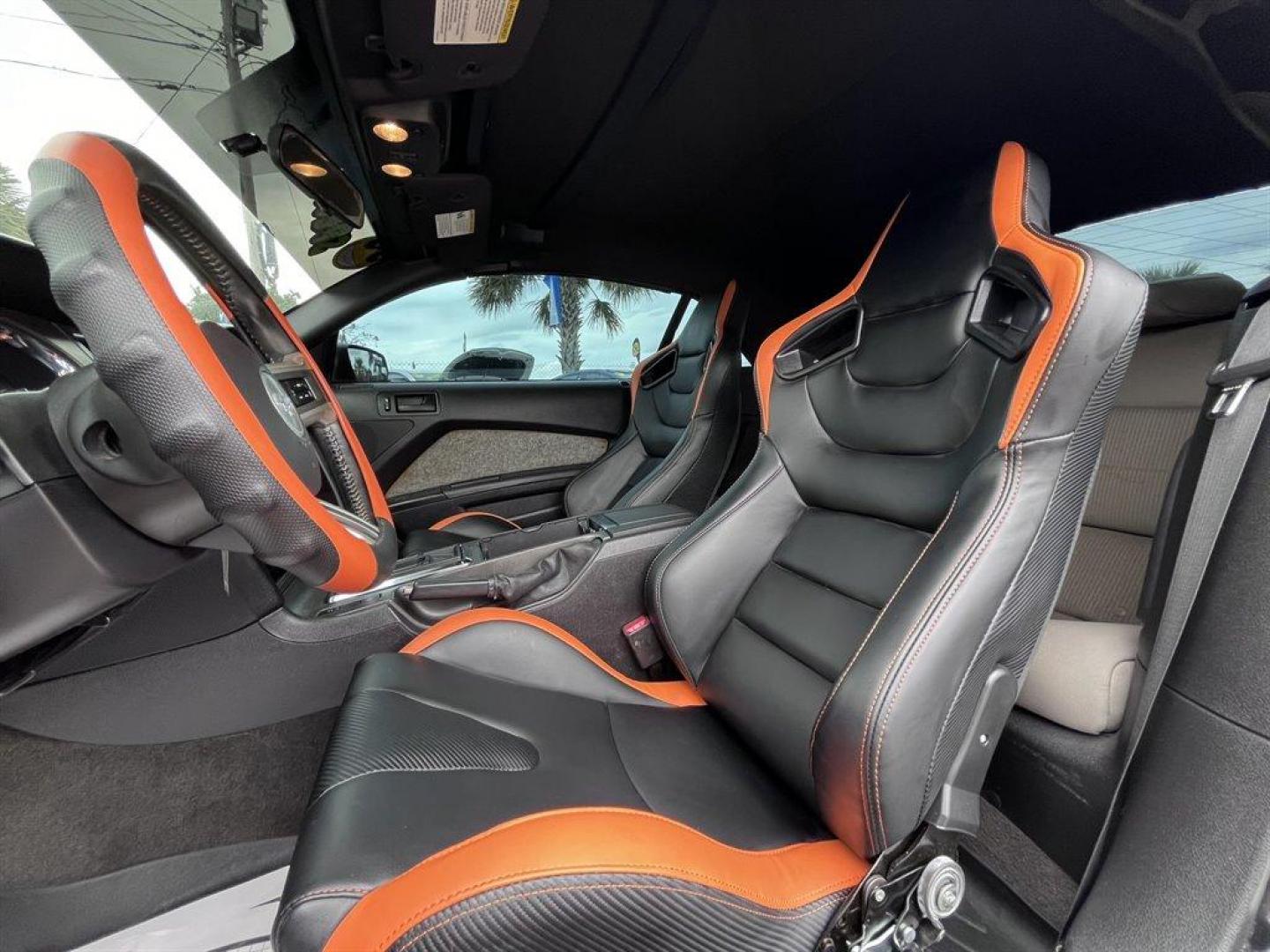 2013 Orange /Black Ford Mustang (1ZVBP8FF6D5) with an 5.0l V8 SFI 5.0l engine, Automatic transmission, located at 745 East Steele Rd., West Columbia, SC, 29170, (803) 755-9148, 33.927212, -81.148483 - Special Internet Price! 2013 Ford Mustang with AM/FM radio, Cruise control, Manual air conditioning, Aftermarket front bucket seats, Powered windows, Powered door locks, Plus more! - Photo#20