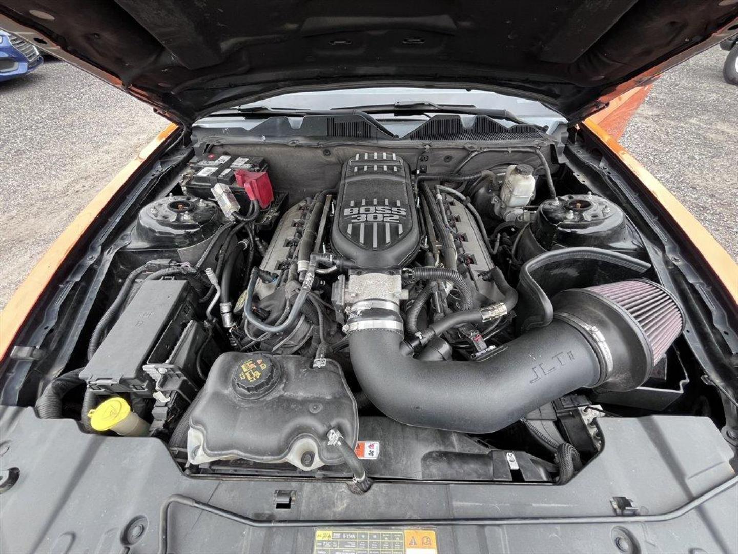 2013 Orange /Black Ford Mustang (1ZVBP8FF6D5) with an 5.0l V8 SFI 5.0l engine, Automatic transmission, located at 745 East Steele Rd., West Columbia, SC, 29170, (803) 755-9148, 33.927212, -81.148483 - Special Internet Price! 2013 Ford Mustang with AM/FM radio, Cruise control, Manual air conditioning, Aftermarket front bucket seats, Powered windows, Powered door locks, Plus more! - Photo#26