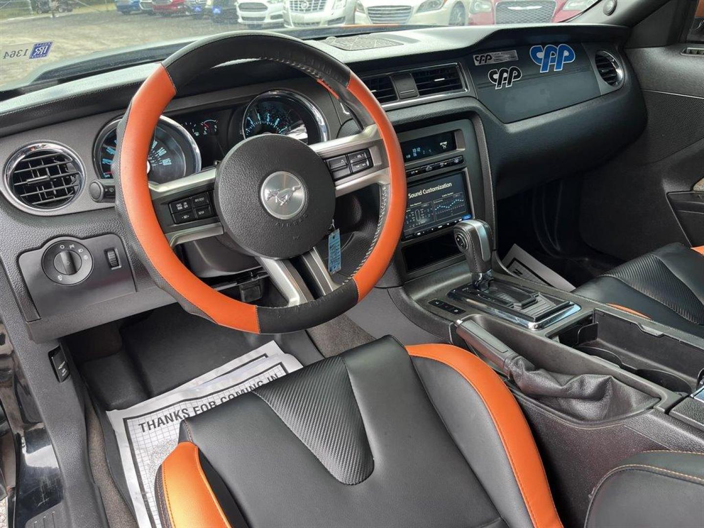 2013 Orange /Black Ford Mustang (1ZVBP8FF6D5) with an 5.0l V8 SFI 5.0l engine, Automatic transmission, located at 745 East Steele Rd., West Columbia, SC, 29170, (803) 755-9148, 33.927212, -81.148483 - Special Internet Price! 2013 Ford Mustang with AM/FM radio, Cruise control, Manual air conditioning, Aftermarket front bucket seats, Powered windows, Powered door locks, Plus more! - Photo#8