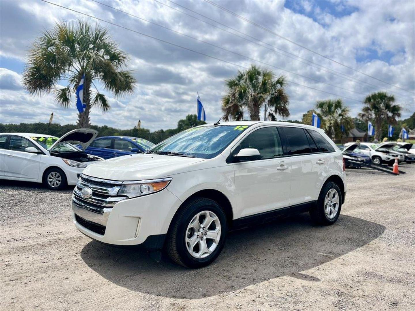 2012 White /Tan Ford Edge (2FMDK3JC2CB) with an 3.5l V6 Smpi Dohc 3.5l engine, Automatic transmission, located at 745 East Steele Rd., West Columbia, SC, 29170, (803) 755-9148, 33.927212, -81.148483 - Special Internet Price! 2012 Ford Edge with AM/FM radio, Cruise control, Manual air conditioning, Leather interior, Powered front seats, Keyless entry, Powered 2nd row, Powered door locks, Powered windows, Plus more! - Photo#0