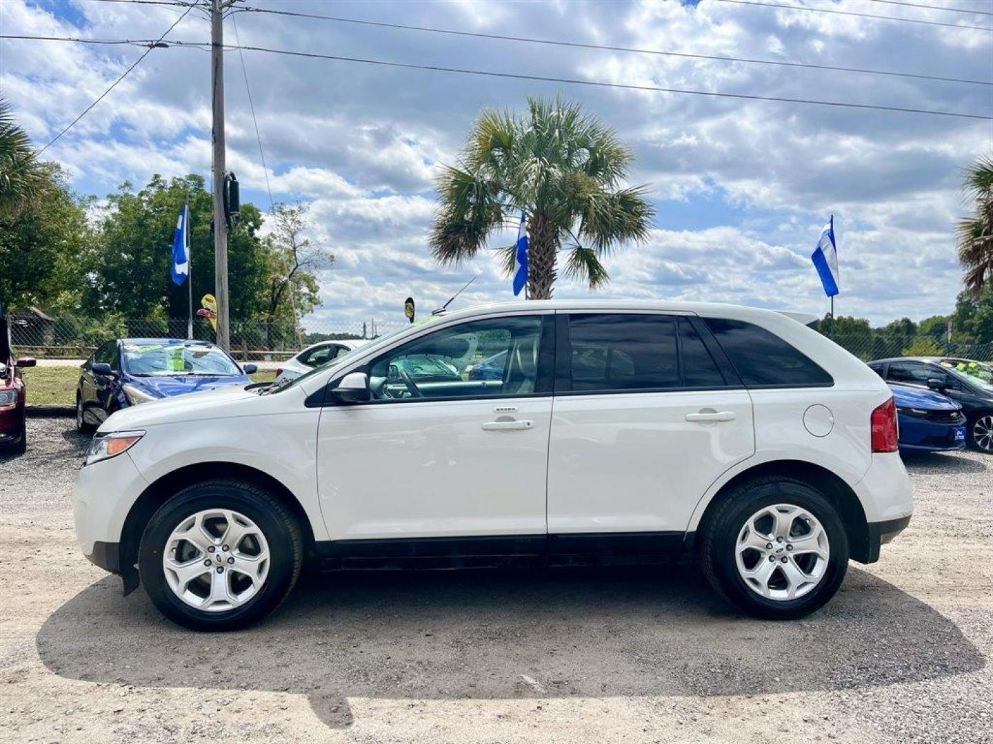 2012 White /Tan Ford Edge (2FMDK3JC2CB) with an 3.5l V6 Smpi Dohc 3.5l engine, Automatic transmission, located at 745 East Steele Rd., West Columbia, SC, 29170, (803) 755-9148, 33.927212, -81.148483 - Special Internet Price! 2012 Ford Edge with AM/FM radio, Cruise control, Manual air conditioning, Leather interior, Powered front seats, Keyless entry, Powered 2nd row, Powered door locks, Powered windows, Plus more! - Photo#1