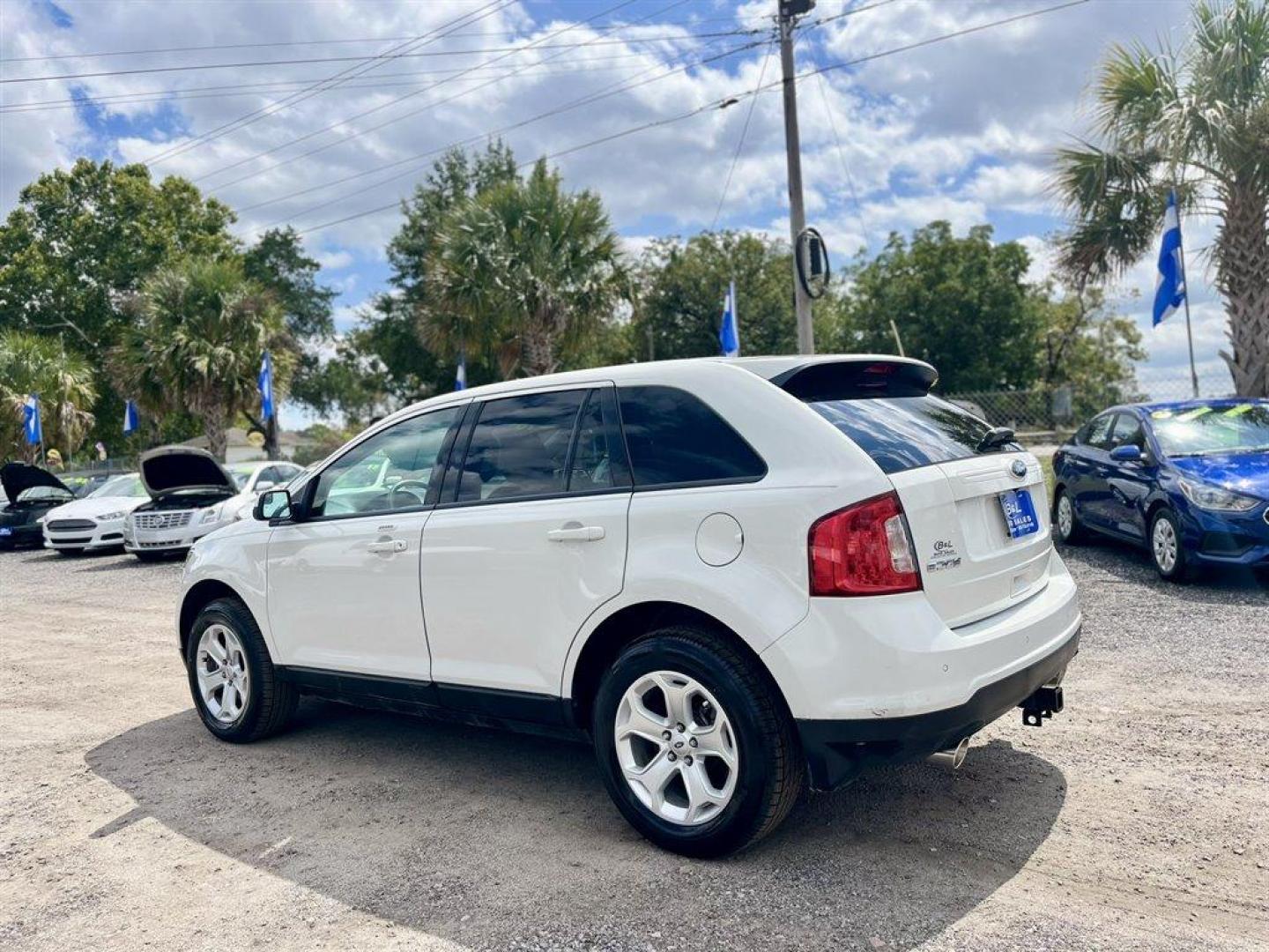 2012 White /Tan Ford Edge (2FMDK3JC2CB) with an 3.5l V6 Smpi Dohc 3.5l engine, Automatic transmission, located at 745 East Steele Rd., West Columbia, SC, 29170, (803) 755-9148, 33.927212, -81.148483 - Special Internet Price! 2012 Ford Edge with AM/FM radio, Cruise control, Manual air conditioning, Leather interior, Powered front seats, Keyless entry, Powered 2nd row, Powered door locks, Powered windows, Plus more! - Photo#2