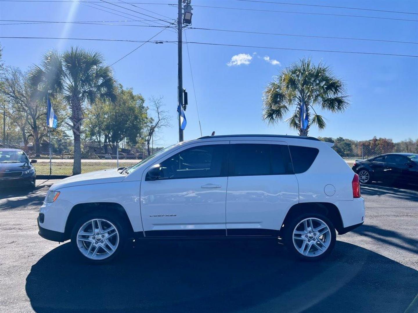 2013 White /Tan Jeep Compass (1C4NJCCB1DD) with an 2.4l I-4 SFI Dohc 2.4l engine, Automatic transmission, located at 745 East Steele Rd., West Columbia, SC, 29170, (803) 755-9148, 33.927212, -81.148483 - Special Internet Price! 2013 Jeep Compass with AM/FM radio, Cruise control, Manual air conditioning, Keyless entry, Powered driver seat, Leather interior, Powered windows, Powered door locks, Plus more! - Photo#1