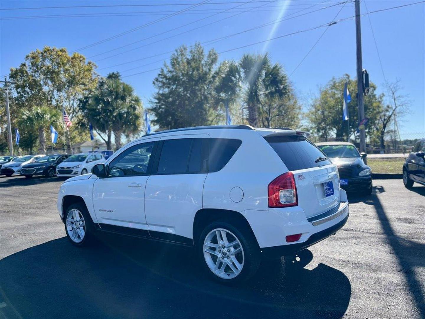 2013 White /Tan Jeep Compass (1C4NJCCB1DD) with an 2.4l I-4 SFI Dohc 2.4l engine, Automatic transmission, located at 745 East Steele Rd., West Columbia, SC, 29170, (803) 755-9148, 33.927212, -81.148483 - Special Internet Price! 2013 Jeep Compass with AM/FM radio, Cruise control, Manual air conditioning, Keyless entry, Powered driver seat, Leather interior, Powered windows, Powered door locks, Plus more! - Photo#2