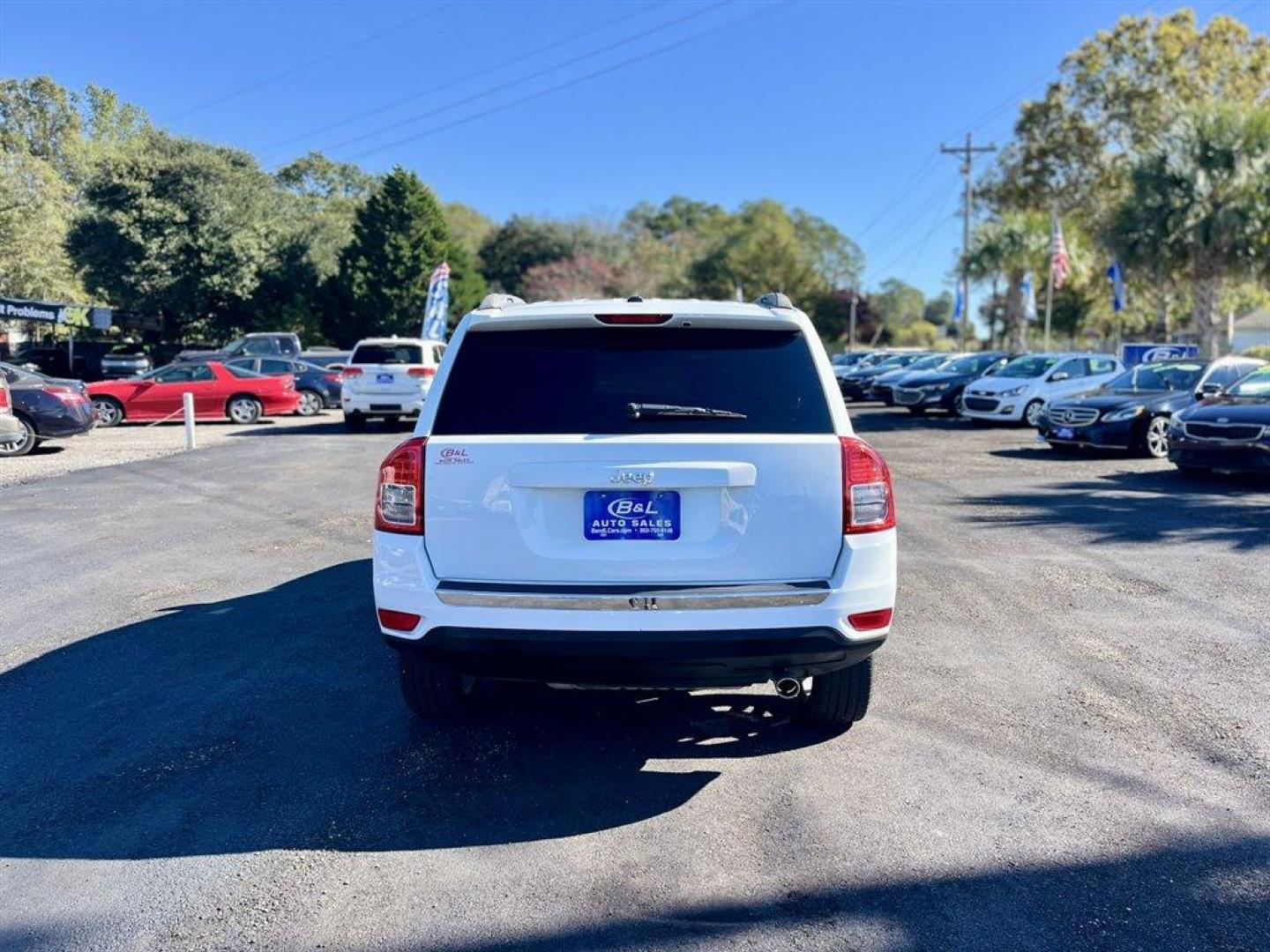 2013 White /Tan Jeep Compass (1C4NJCCB1DD) with an 2.4l I-4 SFI Dohc 2.4l engine, Automatic transmission, located at 745 East Steele Rd., West Columbia, SC, 29170, (803) 755-9148, 33.927212, -81.148483 - Special Internet Price! 2013 Jeep Compass with AM/FM radio, Cruise control, Manual air conditioning, Keyless entry, Powered driver seat, Leather interior, Powered windows, Powered door locks, Plus more! - Photo#3