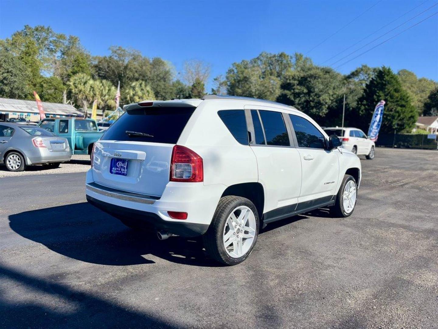 2013 White /Tan Jeep Compass (1C4NJCCB1DD) with an 2.4l I-4 SFI Dohc 2.4l engine, Automatic transmission, located at 745 East Steele Rd., West Columbia, SC, 29170, (803) 755-9148, 33.927212, -81.148483 - Special Internet Price! 2013 Jeep Compass with AM/FM radio, Cruise control, Manual air conditioning, Keyless entry, Powered driver seat, Leather interior, Powered windows, Powered door locks, Plus more! - Photo#4