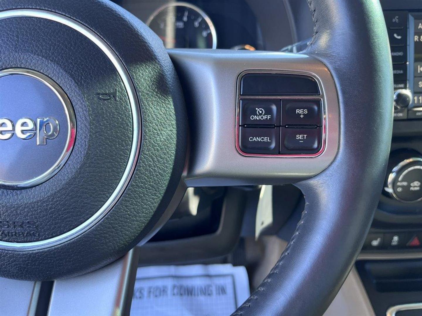 2013 White /Tan Jeep Compass (1C4NJCCB1DD) with an 2.4l I-4 SFI Dohc 2.4l engine, Automatic transmission, located at 745 East Steele Rd., West Columbia, SC, 29170, (803) 755-9148, 33.927212, -81.148483 - Special Internet Price! 2013 Jeep Compass with AM/FM radio, Cruise control, Manual air conditioning, Keyless entry, Powered driver seat, Leather interior, Powered windows, Powered door locks, Plus more! - Photo#11