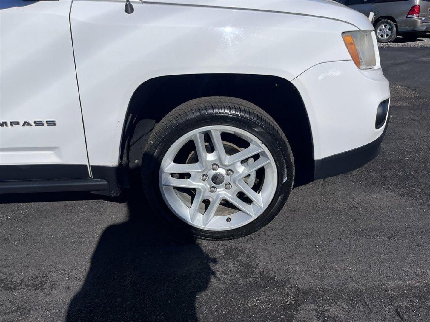 2013 White /Tan Jeep Compass (1C4NJCCB1DD) with an 2.4l I-4 SFI Dohc 2.4l engine, Automatic transmission, located at 745 East Steele Rd., West Columbia, SC, 29170, (803) 755-9148, 33.927212, -81.148483 - Special Internet Price! 2013 Jeep Compass with AM/FM radio, Cruise control, Manual air conditioning, Keyless entry, Powered driver seat, Leather interior, Powered windows, Powered door locks, Plus more! - Photo#31