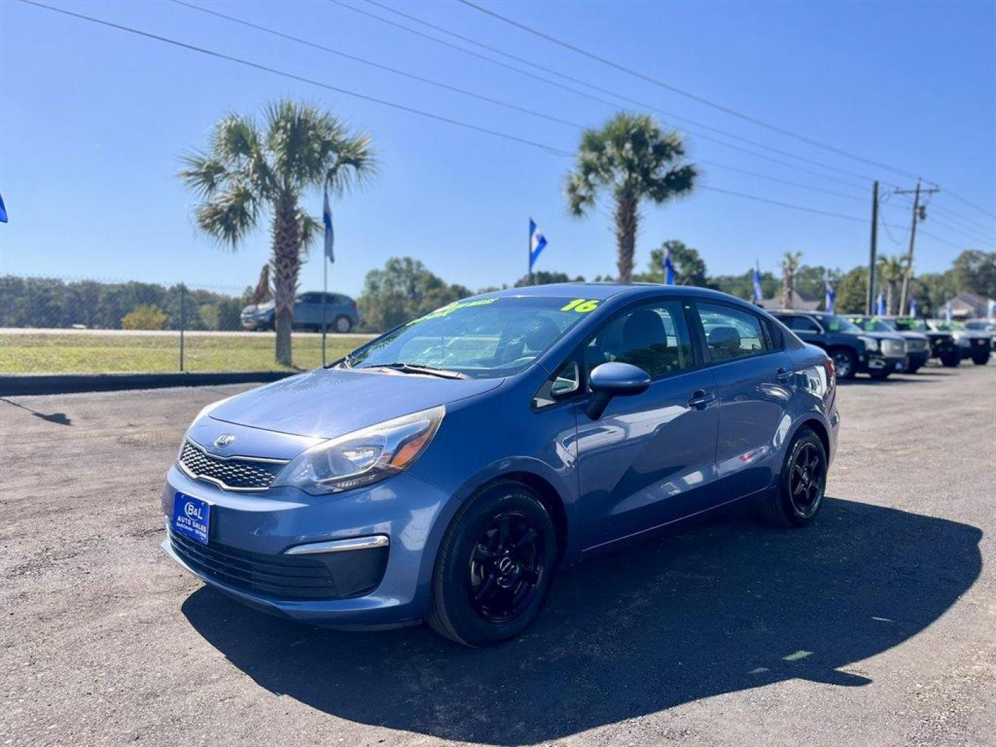 2016 Blue /Black Kia Rio (KNADM4A30G6) with an 1.6l I-4 DI Dohc Cvvt 1.6 engine, Automatic transmission, located at 745 East Steele Rd., West Columbia, SC, 29170, (803) 755-9148, 33.927212, -81.148483 - Special Internet Price! 2016 Kia Rio with AM/FM/CD MP3 Audio System, Manual Air Conditioning, 60-40 Folding Bench Rear Seat, Front Bucket Seats, Fabric Seats, Powered Windows, Powered Door Locks, Plus More! - Photo#0