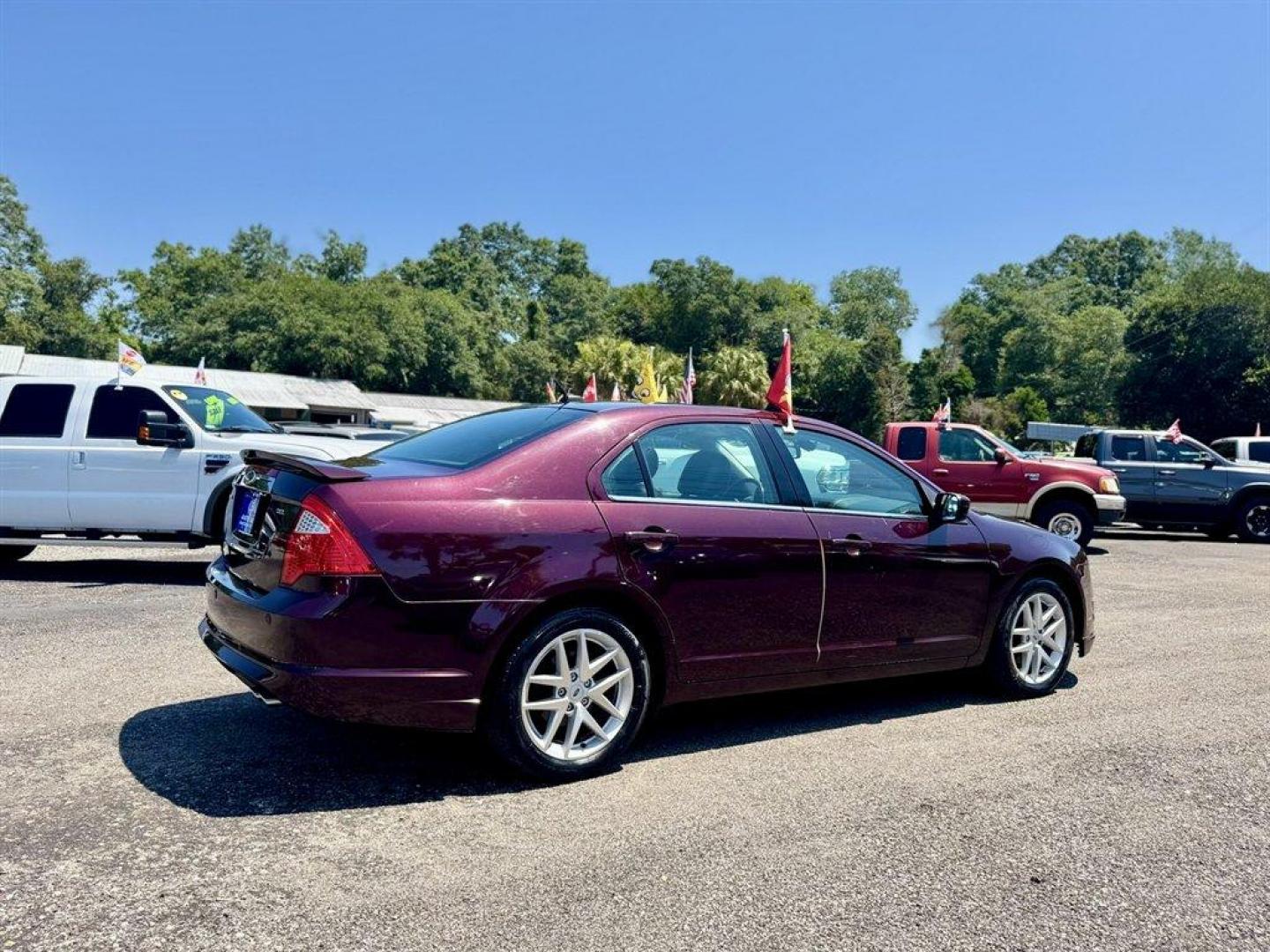 2012 Purple /Black Ford Fusion (3FAHP0JA1CR) with an 2.5l I-4 Smpi Dohc 2.5l engine, Automatic transmission, located at 745 East Steele Rd., West Columbia, SC, 29170, (803) 755-9148, 33.927212, -81.148483 - Special Internet Price! 2012 Ford Fusion with AM/FM radio, Cruise control, Backup camera, Sunroof, Leather interior, Powered front seats, Powered windows, Powered door locks, Plus more! - Photo#3