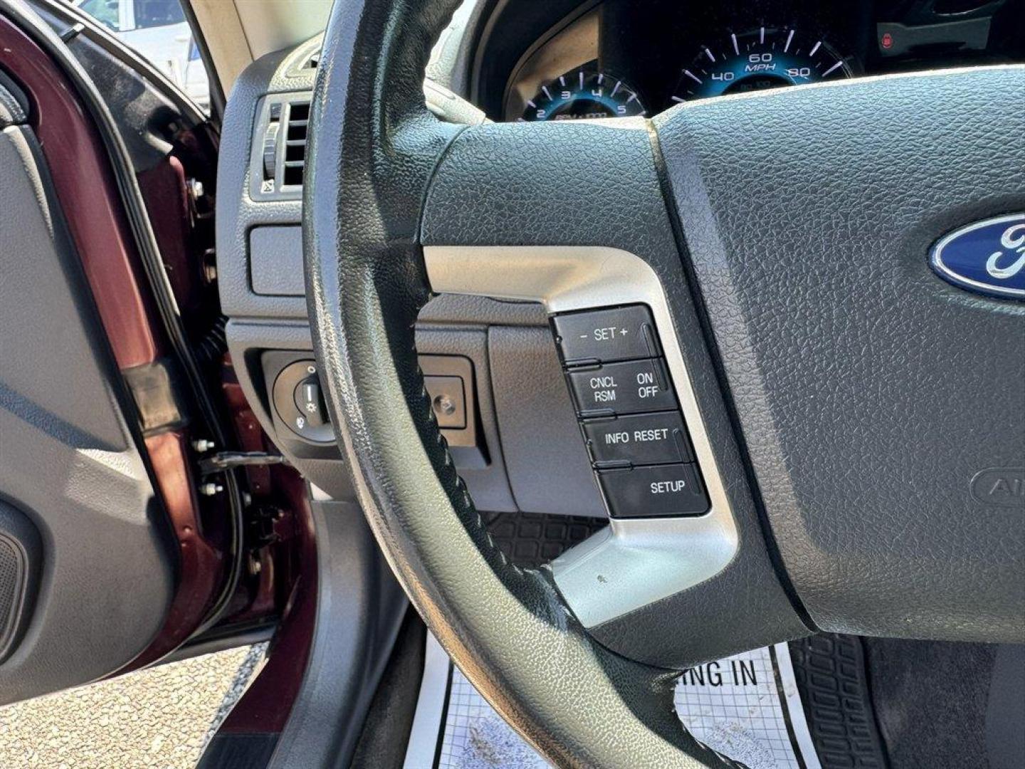 2012 Purple /Black Ford Fusion (3FAHP0JA1CR) with an 2.5l I-4 Smpi Dohc 2.5l engine, Automatic transmission, located at 745 East Steele Rd., West Columbia, SC, 29170, (803) 755-9148, 33.927212, -81.148483 - Special Internet Price! 2012 Ford Fusion with AM/FM radio, Cruise control, Backup camera, Sunroof, Leather interior, Powered front seats, Powered windows, Powered door locks, Plus more! - Photo#8