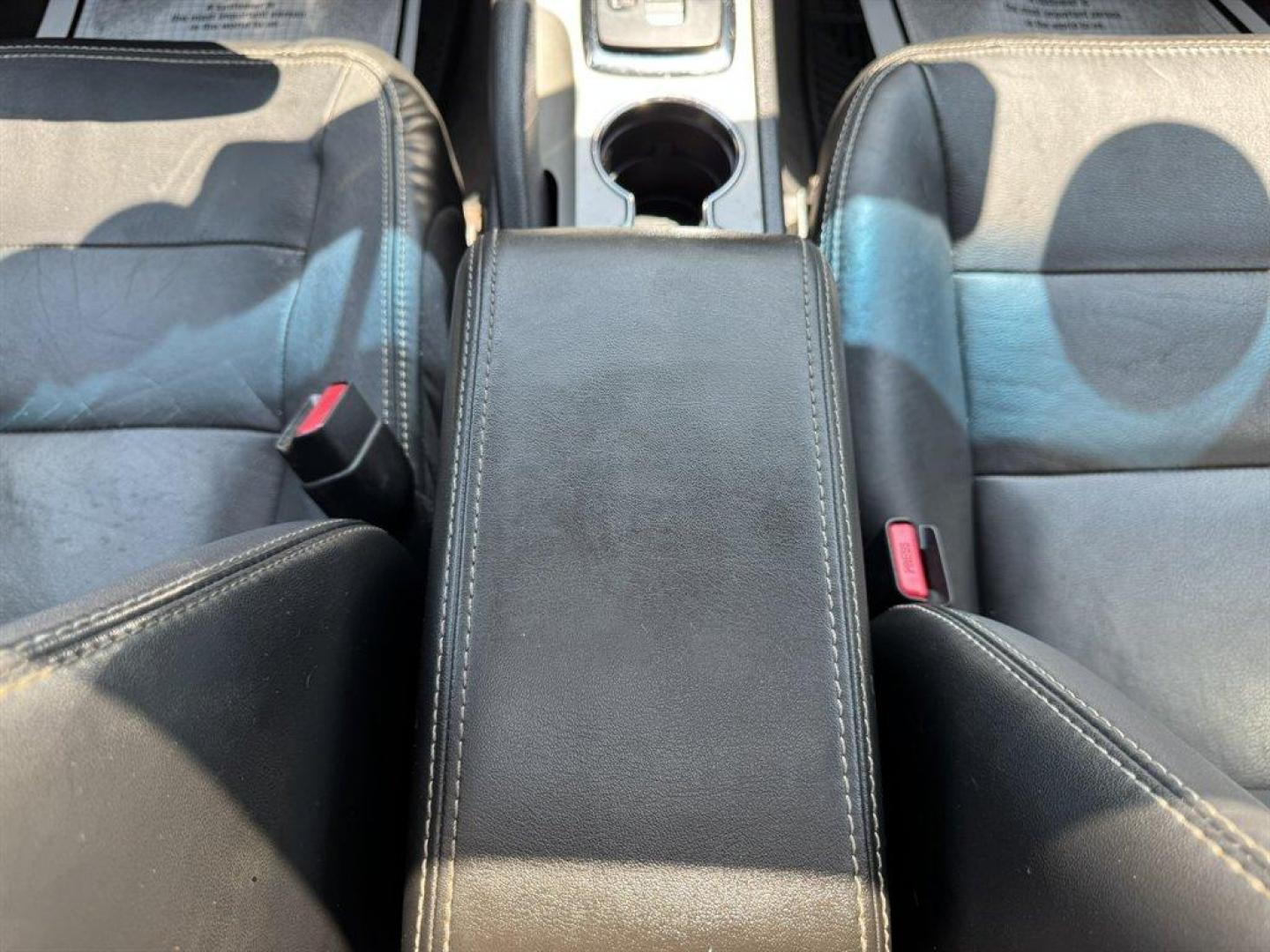 2012 Purple /Black Ford Fusion (3FAHP0JA1CR) with an 2.5l I-4 Smpi Dohc 2.5l engine, Automatic transmission, located at 745 East Steele Rd., West Columbia, SC, 29170, (803) 755-9148, 33.927212, -81.148483 - Special Internet Price! 2012 Ford Fusion with AM/FM radio, Cruise control, Backup camera, Sunroof, Leather interior, Powered front seats, Powered windows, Powered door locks, Plus more! - Photo#14