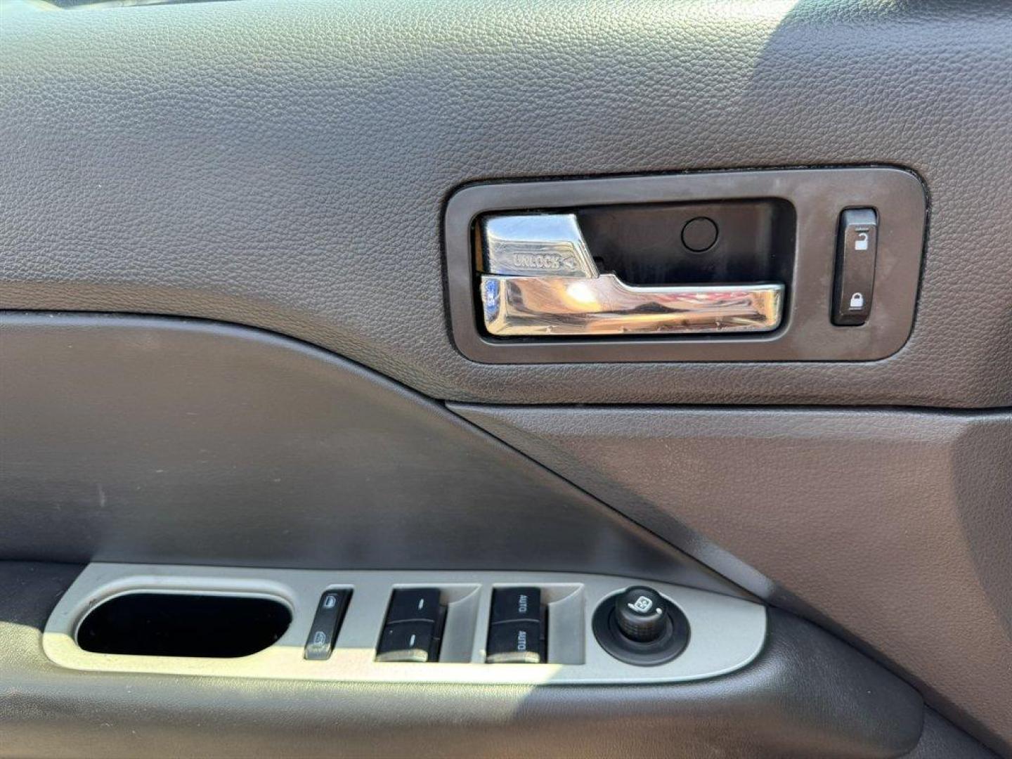 2012 Purple /Black Ford Fusion (3FAHP0JA1CR) with an 2.5l I-4 Smpi Dohc 2.5l engine, Automatic transmission, located at 745 East Steele Rd., West Columbia, SC, 29170, (803) 755-9148, 33.927212, -81.148483 - Special Internet Price! 2012 Ford Fusion with AM/FM radio, Cruise control, Backup camera, Sunroof, Leather interior, Powered front seats, Powered windows, Powered door locks, Plus more! - Photo#22