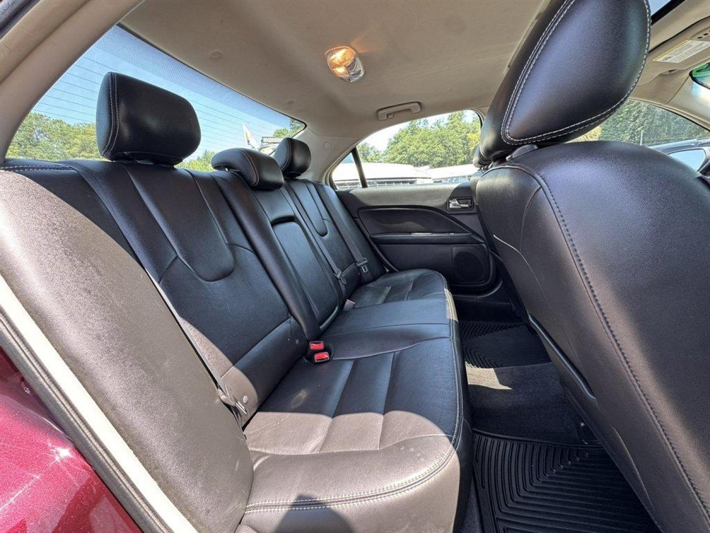 2012 Purple /Black Ford Fusion (3FAHP0JA1CR) with an 2.5l I-4 Smpi Dohc 2.5l engine, Automatic transmission, located at 745 East Steele Rd., West Columbia, SC, 29170, (803) 755-9148, 33.927212, -81.148483 - Special Internet Price! 2012 Ford Fusion with AM/FM radio, Cruise control, Backup camera, Sunroof, Leather interior, Powered front seats, Powered windows, Powered door locks, Plus more! - Photo#28