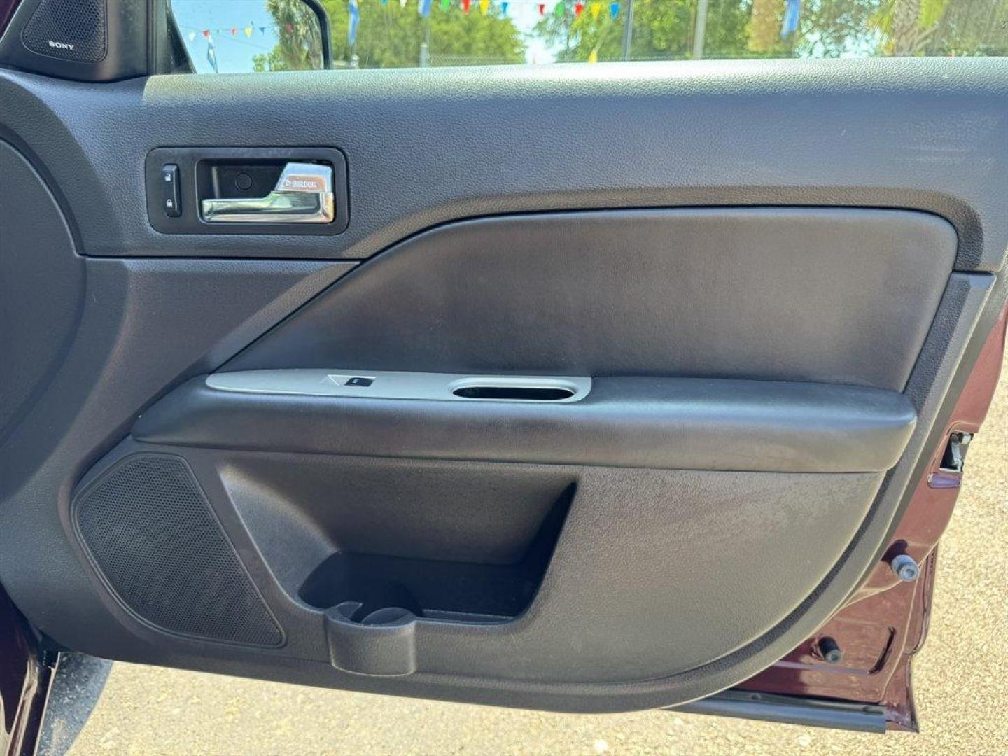 2012 Purple /Black Ford Fusion (3FAHP0JA1CR) with an 2.5l I-4 Smpi Dohc 2.5l engine, Automatic transmission, located at 745 East Steele Rd., West Columbia, SC, 29170, (803) 755-9148, 33.927212, -81.148483 - Special Internet Price! 2012 Ford Fusion with AM/FM radio, Cruise control, Backup camera, Sunroof, Leather interior, Powered front seats, Powered windows, Powered door locks, Plus more! - Photo#29