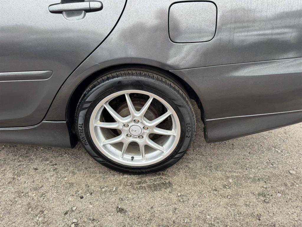 2003 Grey /Grey Toyota Camry (4T1BE32K43U) with an 2.4l I-4 EFI Dohc 2.4l engine, Automatic transmission, located at 745 East Steele Rd., West Columbia, SC, 29170, (803) 755-9148, 33.927212, -81.148483 - Special Internet Price! 2003 Toyota Camry LE - Photo#24