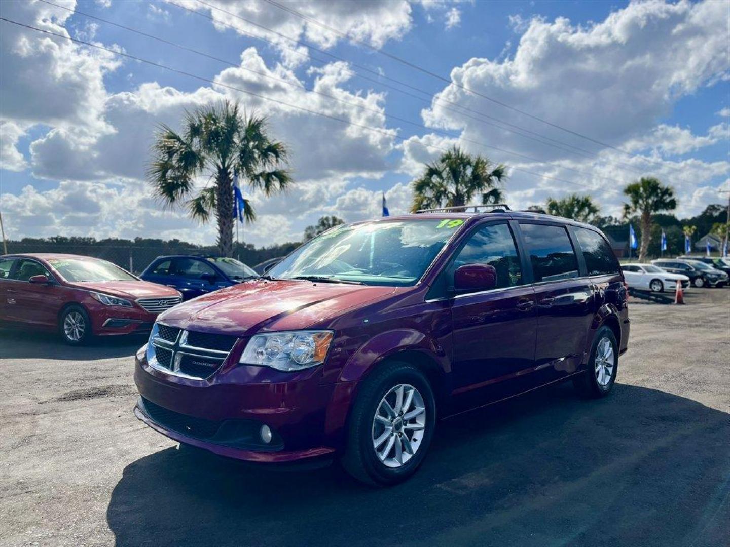 2019 Red /Black Dodge Grand Caravan (2C4RDGCG6KR) with an 3.6l V6 MPI Dohc VVT Flex engine, Automatic transmission, located at 745 East Steele Rd., West Columbia, SC, 29170, (803) 755-9148, 33.927212, -81.148483 - Special Internet Price! 2019 Dodge Grand Caravan With AM/FM Radio, 1 LCD Monitor In The Front, Uconnect, Cruise Control, Leather Interior, Bucket Front Seats, 2nd Row Stow 'N Go Bucket Seats, 3nd Row Stow 'N Go Bench Seats, Powered Slide Side Doors, Powered Liftgate, Powered Windows, Powered Door Lo - Photo#0