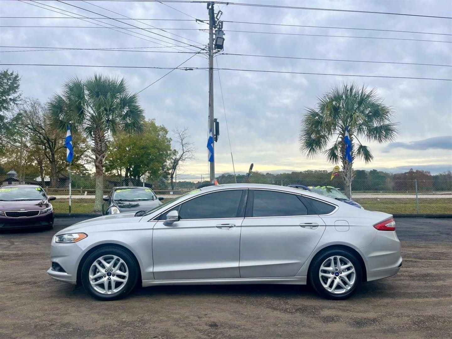 2014 Silver /Tan Ford Fusion (3FA6P0HDXER) with an 1.5l I-4 DI Dohc Ecoboost engine, Automatic transmission, located at 745 East Steele Rd., West Columbia, SC, 29170, (803) 755-9148, 33.927212, -81.148483 - Special Internet Price! 2014 Ford Fusion with AM/FM radio, Leather interior, Backup camera, Cruise control, Powered front seats, Keyless entry, Powered windows, Powered door locks, Plus more! - Photo#1