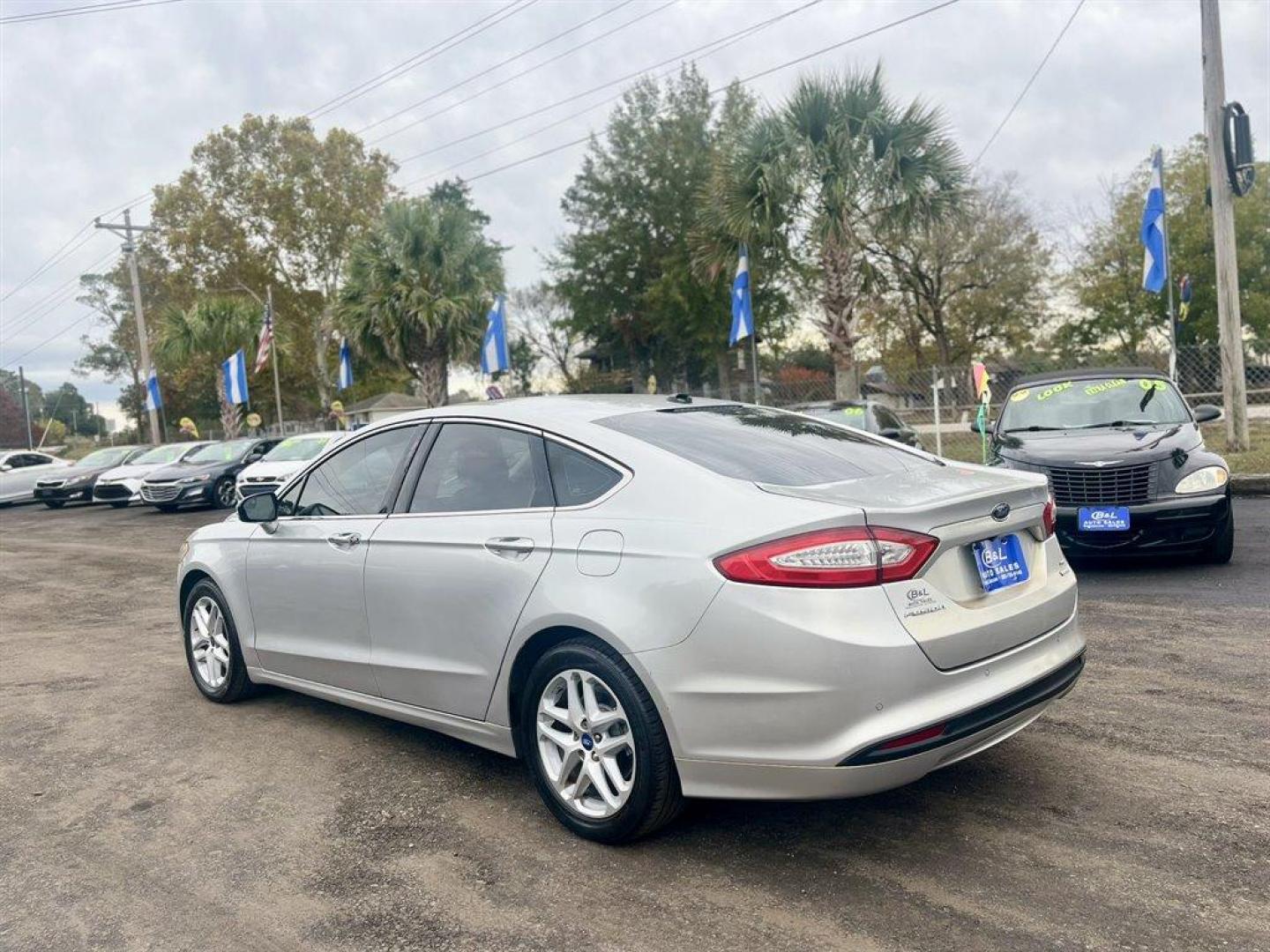 2014 Silver /Tan Ford Fusion (3FA6P0HDXER) with an 1.5l I-4 DI Dohc Ecoboost engine, Automatic transmission, located at 745 East Steele Rd., West Columbia, SC, 29170, (803) 755-9148, 33.927212, -81.148483 - Special Internet Price! 2014 Ford Fusion with AM/FM radio, Leather interior, Backup camera, Cruise control, Powered front seats, Keyless entry, Powered windows, Powered door locks, Plus more! - Photo#2