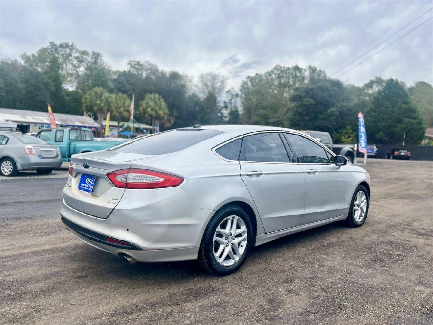 2014 Silver /Tan Ford Fusion (3FA6P0HDXER) with an 1.5l I-4 DI Dohc Ecoboost engine, Automatic transmission, located at 745 East Steele Rd., West Columbia, SC, 29170, (803) 755-9148, 33.927212, -81.148483 - Special Internet Price! 2014 Ford Fusion with AM/FM radio, Leather interior, Backup camera, Cruise control, Powered front seats, Keyless entry, Powered windows, Powered door locks, Plus more! - Photo#4