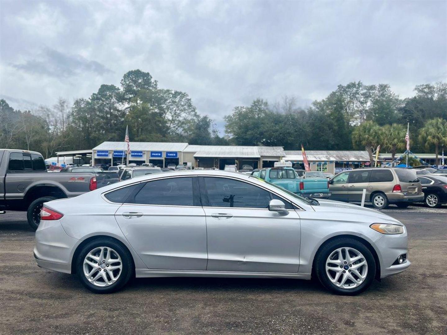 2014 Silver /Tan Ford Fusion (3FA6P0HDXER) with an 1.5l I-4 DI Dohc Ecoboost engine, Automatic transmission, located at 745 East Steele Rd., West Columbia, SC, 29170, (803) 755-9148, 33.927212, -81.148483 - Special Internet Price! 2014 Ford Fusion with AM/FM radio, Leather interior, Backup camera, Cruise control, Powered front seats, Keyless entry, Powered windows, Powered door locks, Plus more! - Photo#5