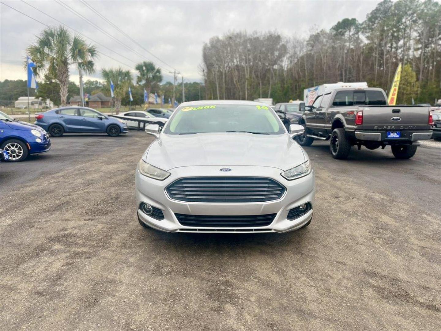 2014 Silver /Tan Ford Fusion (3FA6P0HDXER) with an 1.5l I-4 DI Dohc Ecoboost engine, Automatic transmission, located at 745 East Steele Rd., West Columbia, SC, 29170, (803) 755-9148, 33.927212, -81.148483 - Special Internet Price! 2014 Ford Fusion with AM/FM radio, Leather interior, Backup camera, Cruise control, Powered front seats, Keyless entry, Powered windows, Powered door locks, Plus more! - Photo#7